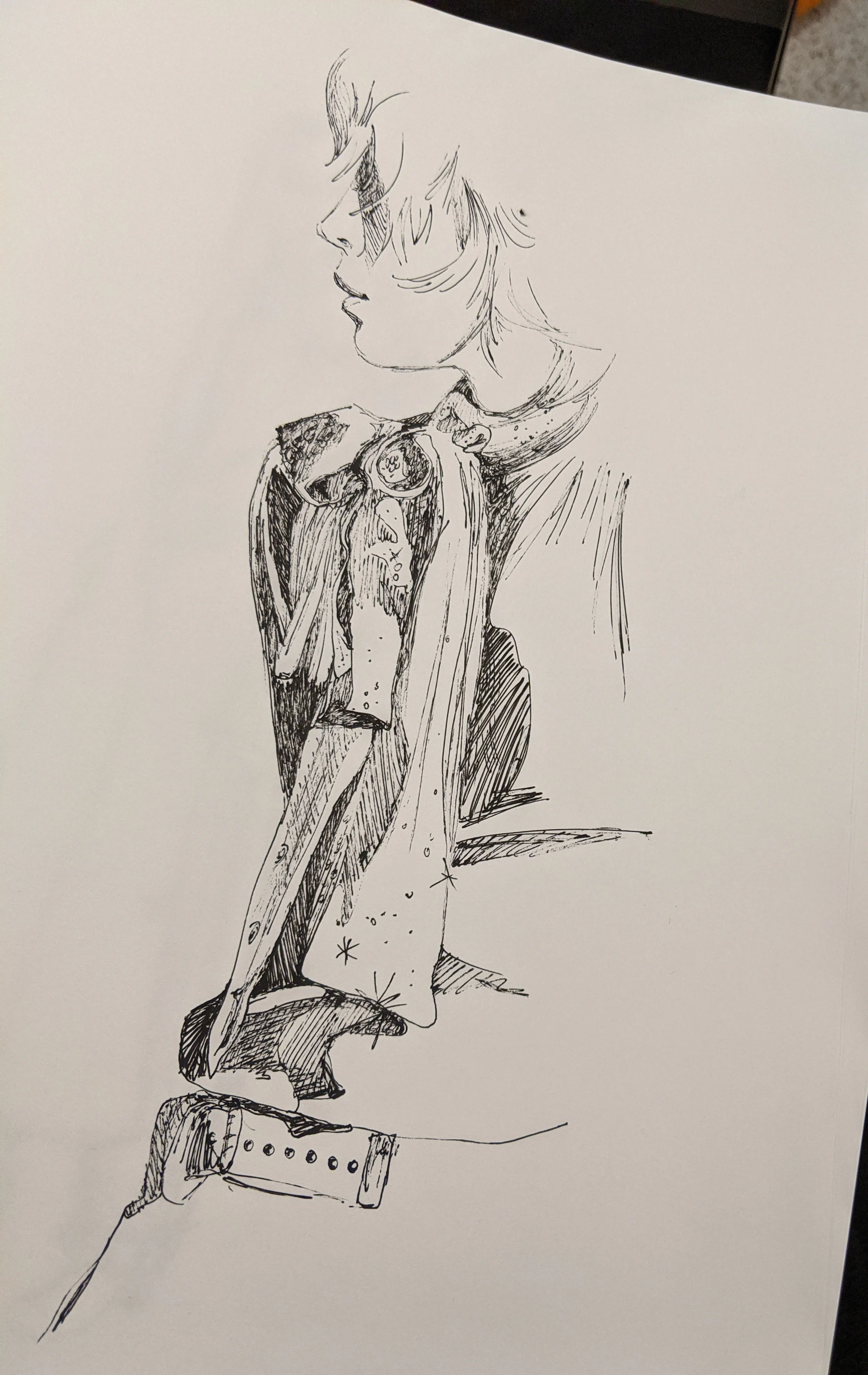 Line drawing of a woman with short hair looking to the left, wearing a jacket with stars and a shirt with dots.