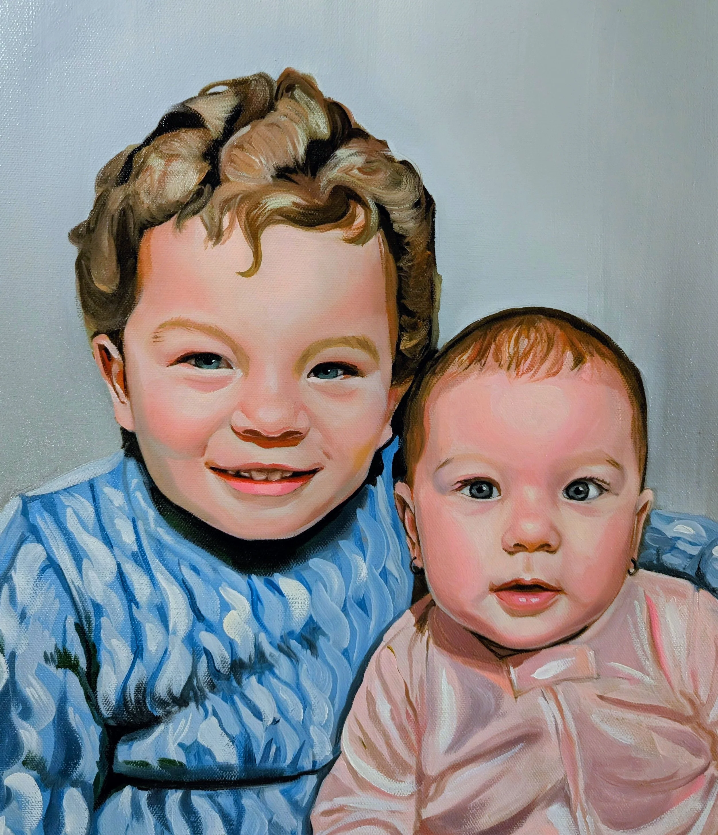 Realistic oil portrait of a small boy wearing a blue cable knit sweater and a baby girl wearing a pink onesie, painted on canvas by Brandy Mahaney