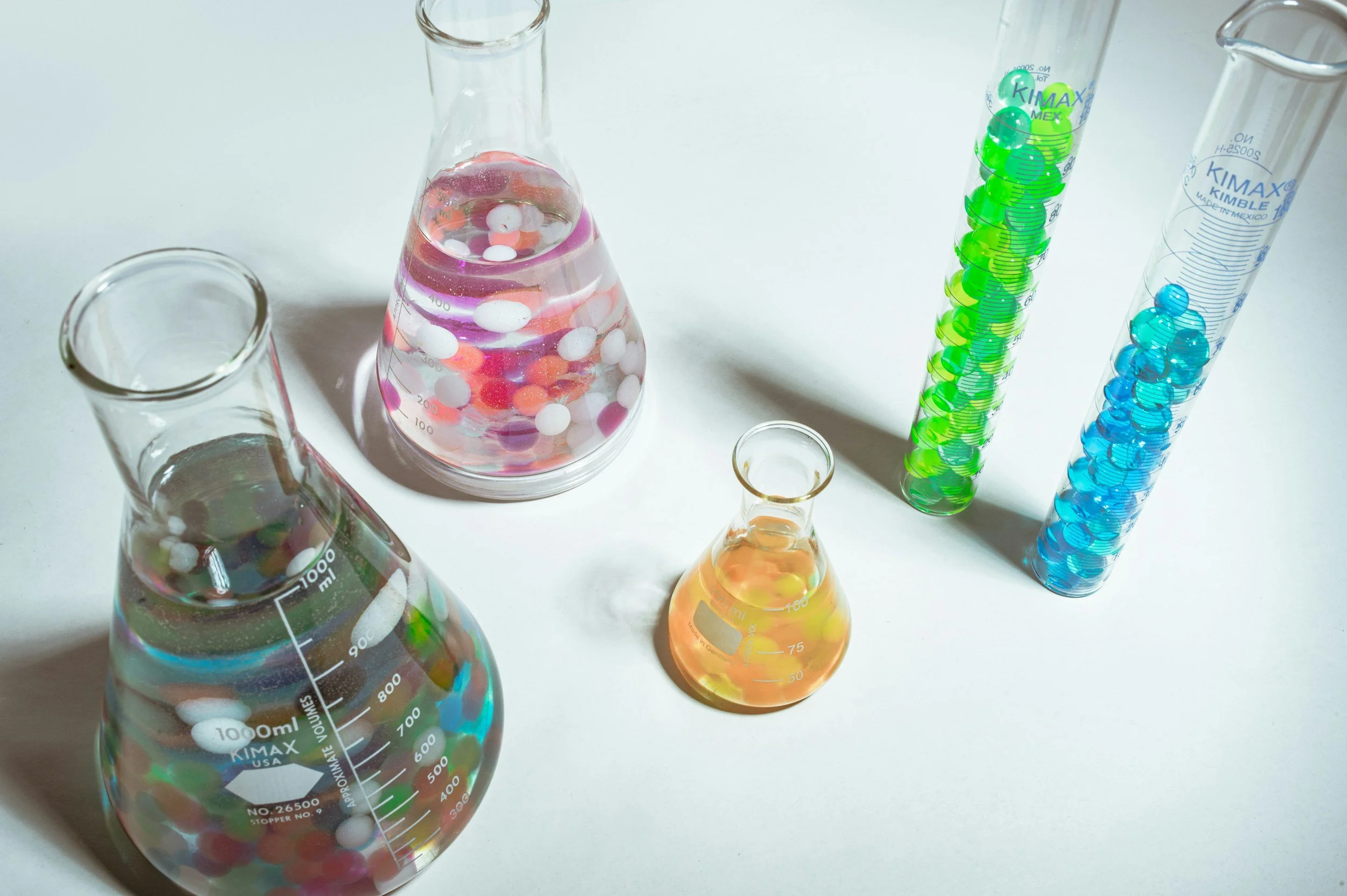  Cosmetic Chemist Formulations, beakers, colored products, skin care, hair care, personal care