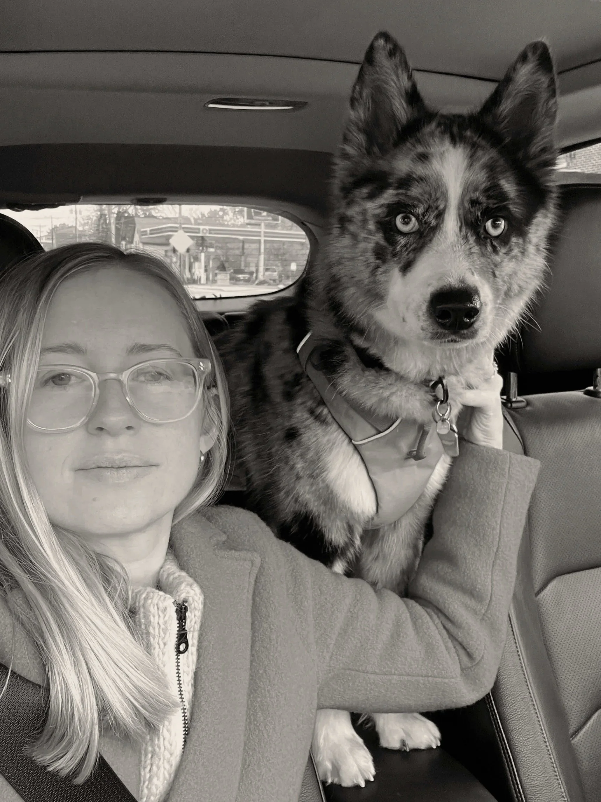 Photograph of artist, Cate Virnich, and dog named Opal.