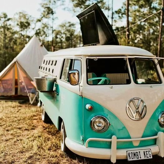 Vintage Kombi Keg tap bus from Kombi Keg RVA serving drinks at an outdoor event, offering a unique mobile bar experience in Virginia