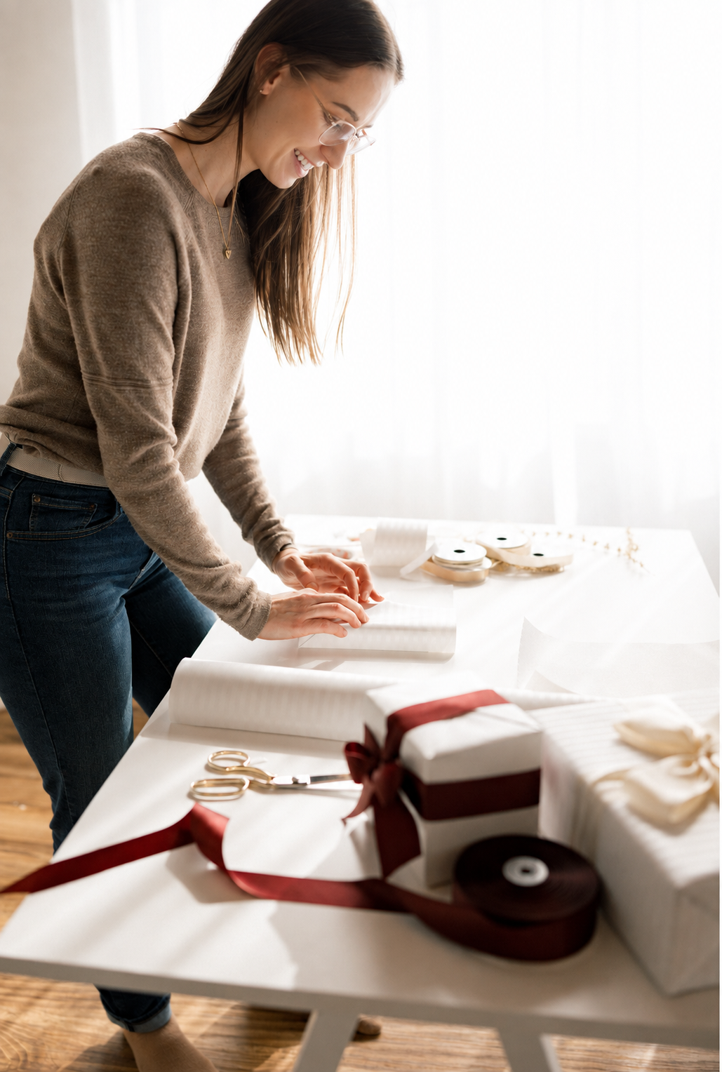Wrapping gifts on site at a client table