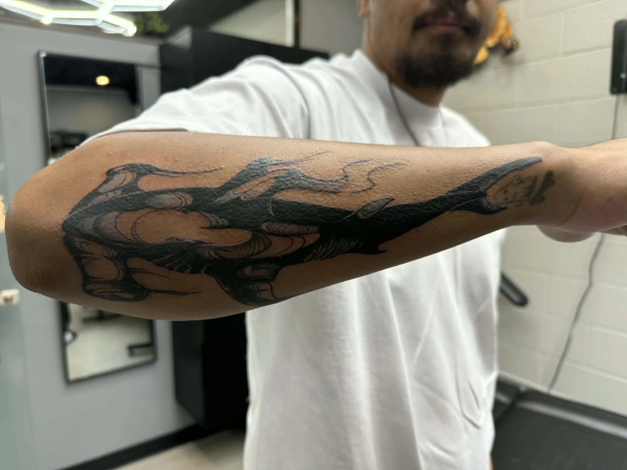 Hammer head shark tattoo done on forearm placement in Neo traditional style