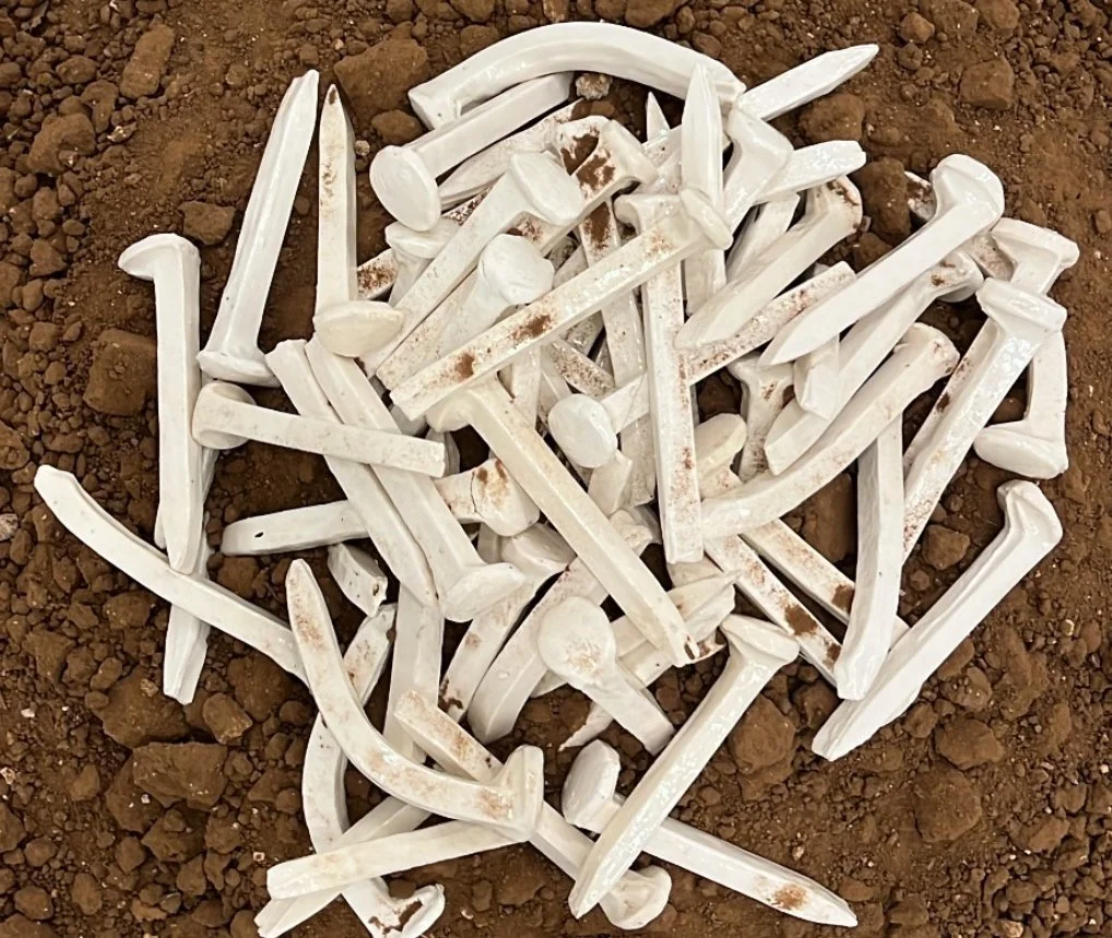 Hitting Home, Porcelain, dirt, 7x24x24 in, 2025