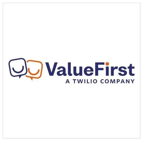 ValueFirst logo with two smiling chat bubbles, one in blue and one in orange, and the text "ValueFirst" with a tagline "A Twilio Company".