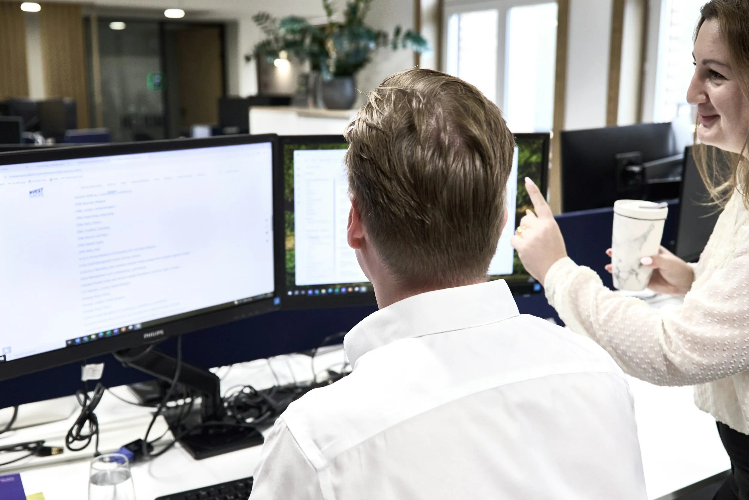 Image of staff working in a Service Center to collaborate to meet customer needs.