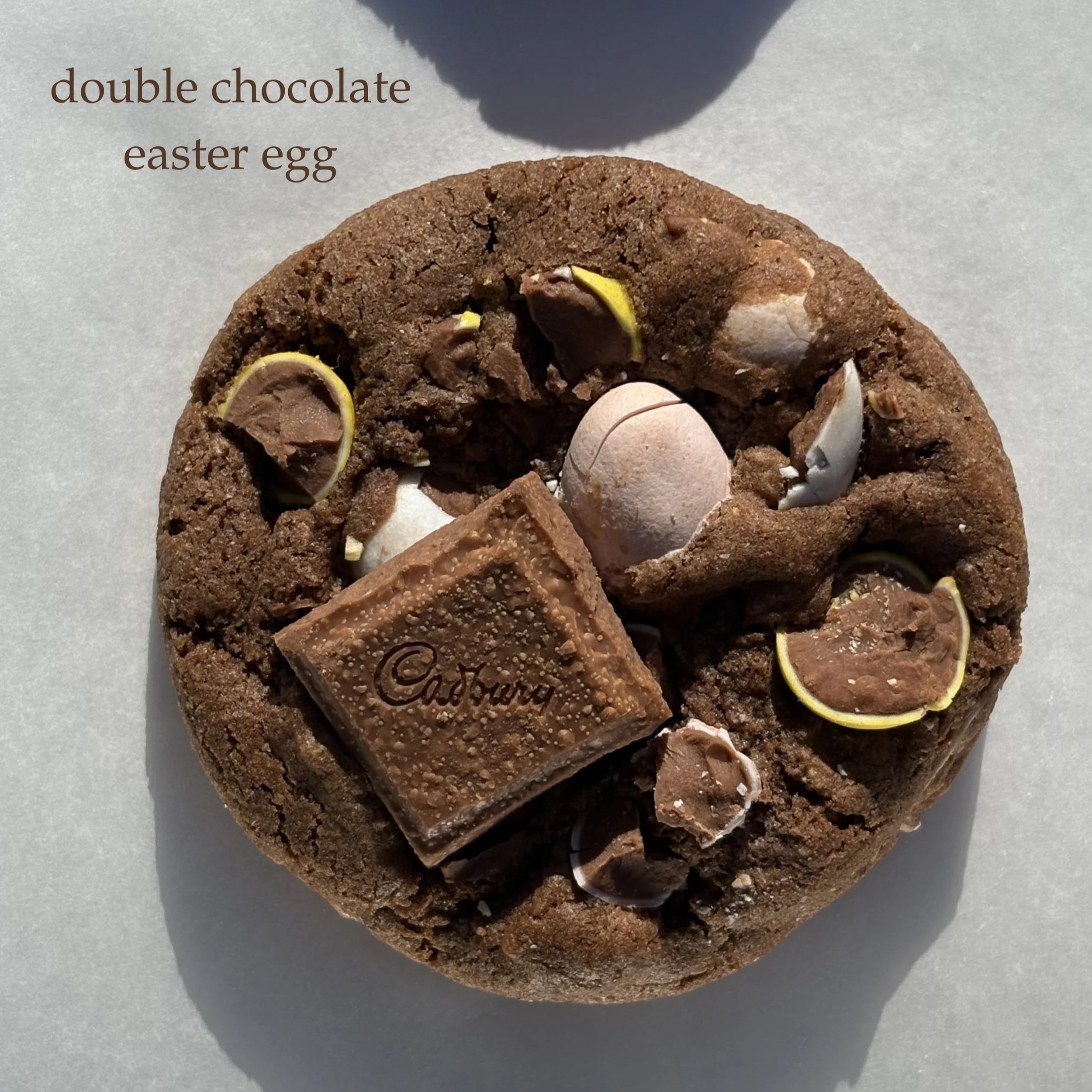 Chocolate cookie with mini Easter eggs and a Hershey's chocolate square on top