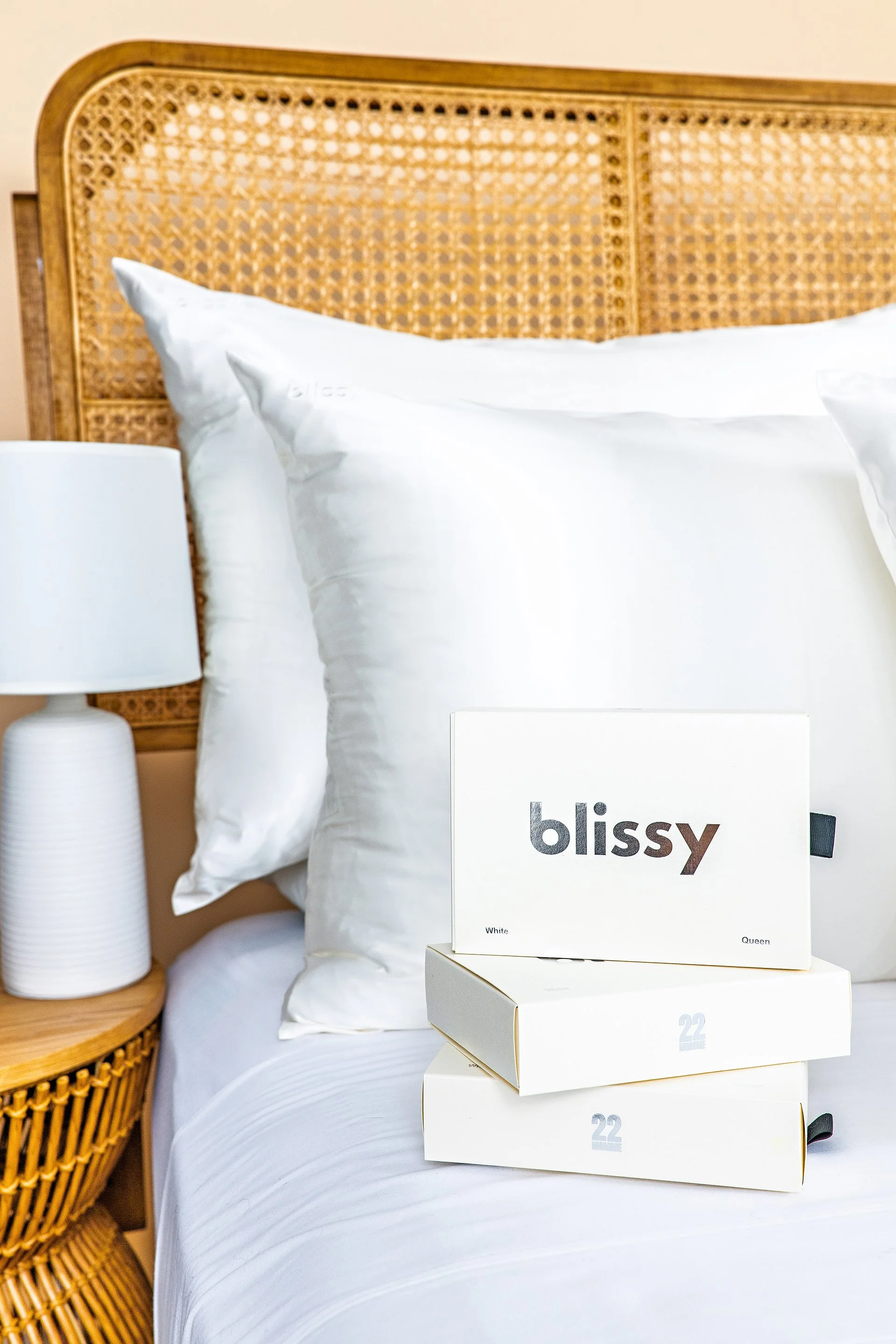 lifestyle product photography of silk pillowcase for sleep and beauty brand marketing