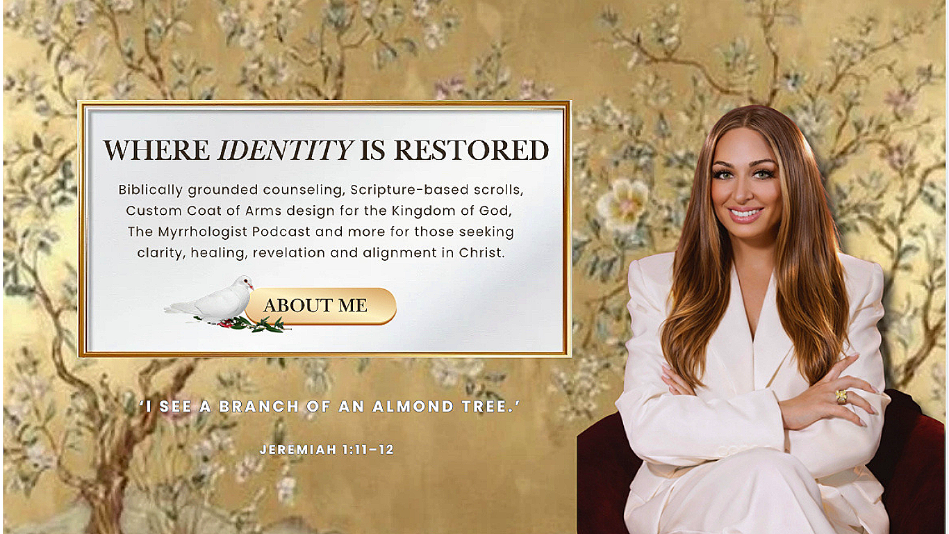 A smiling woman with long brown hair in a white suit sitting with her arms crossed, next to a text box with a dove and an 'About Me' button on a gold background, in front of a floral wallpaper.
