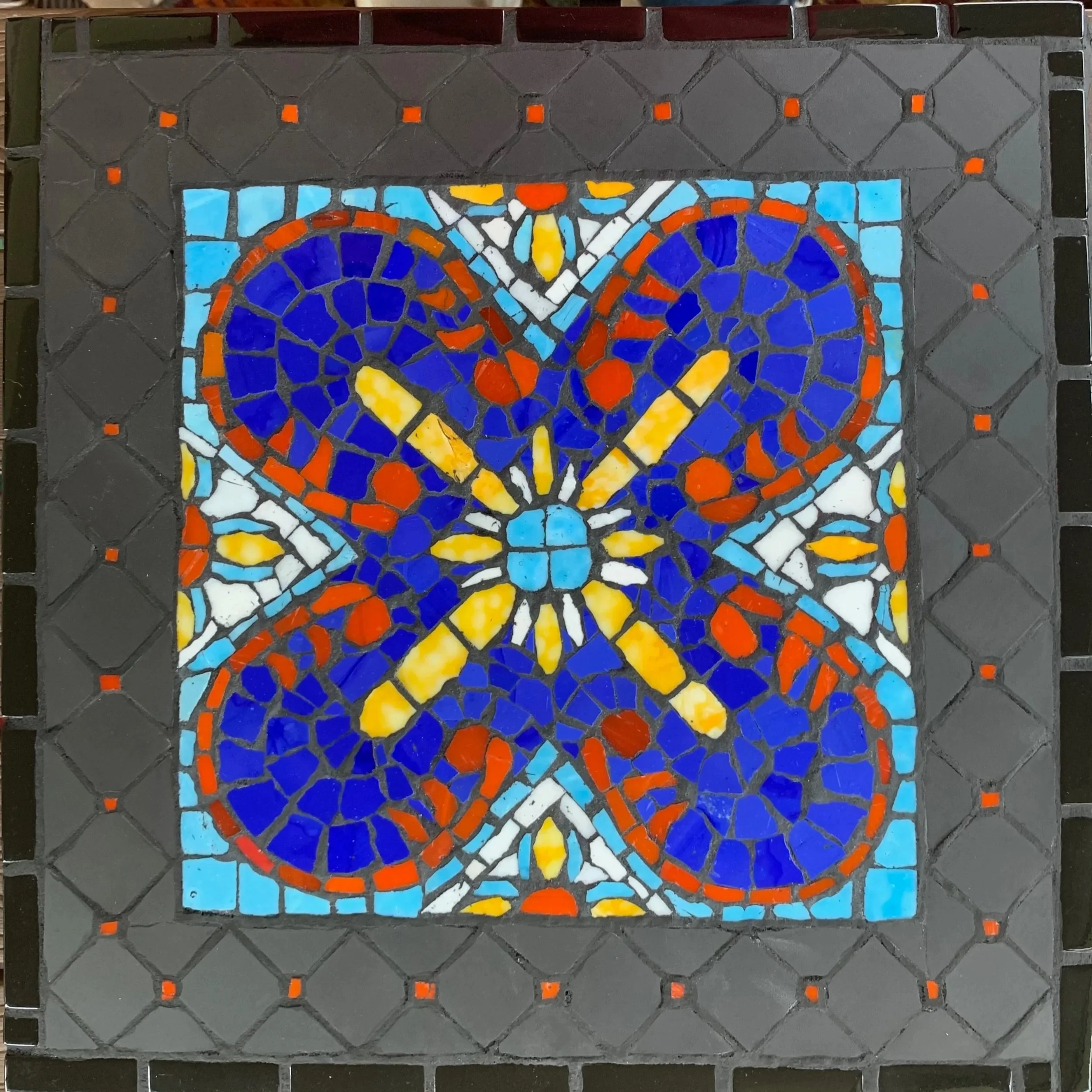 Talavera Love, 8"x8", Mexican smalti and unglazed porcelain tile, constructed in reverse method so that the surface is completely smooth.  2020