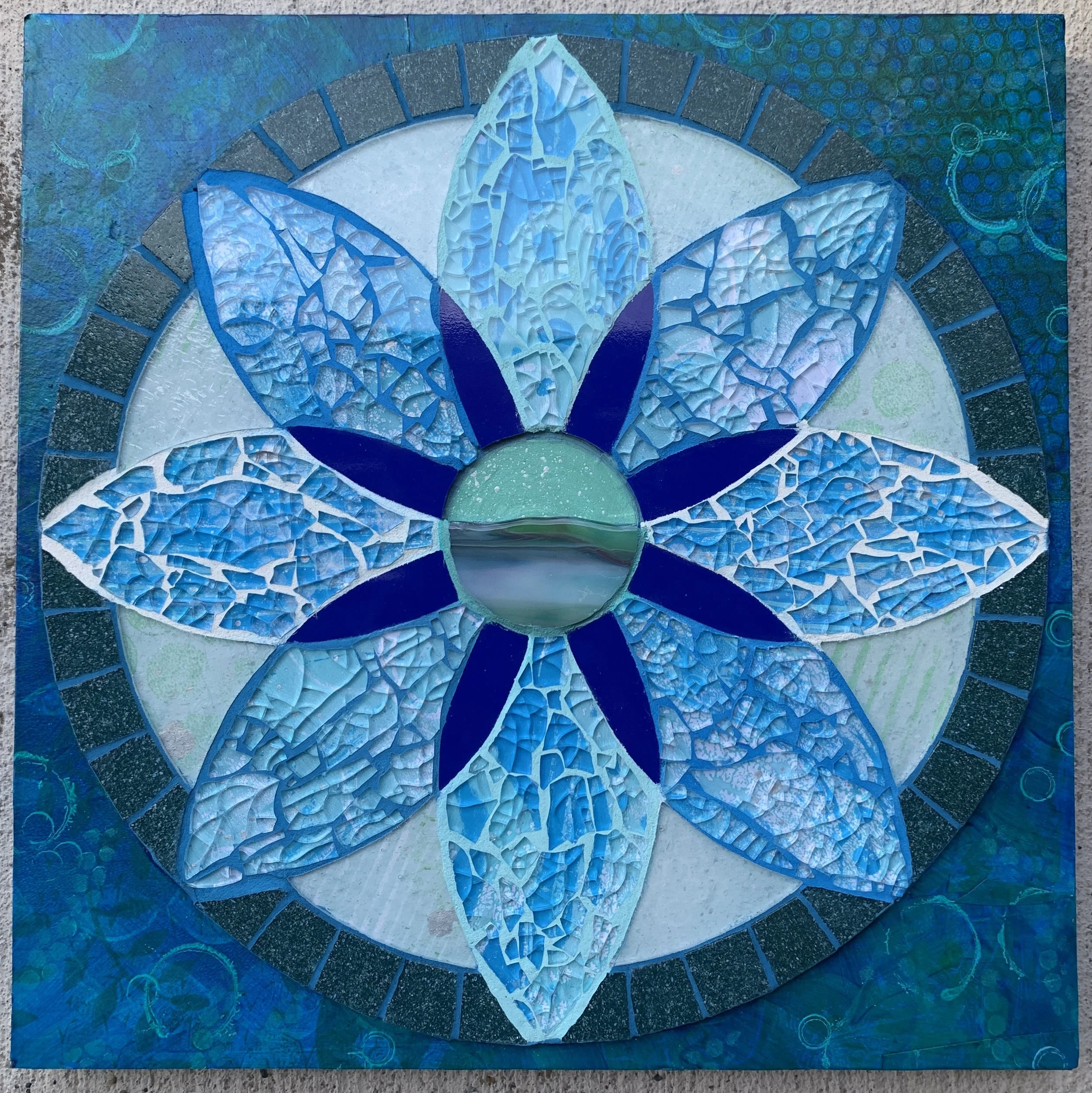 The Mariner, 12"x12", tempered glass, stained glass and glass tiles over hand painted collage.  2026