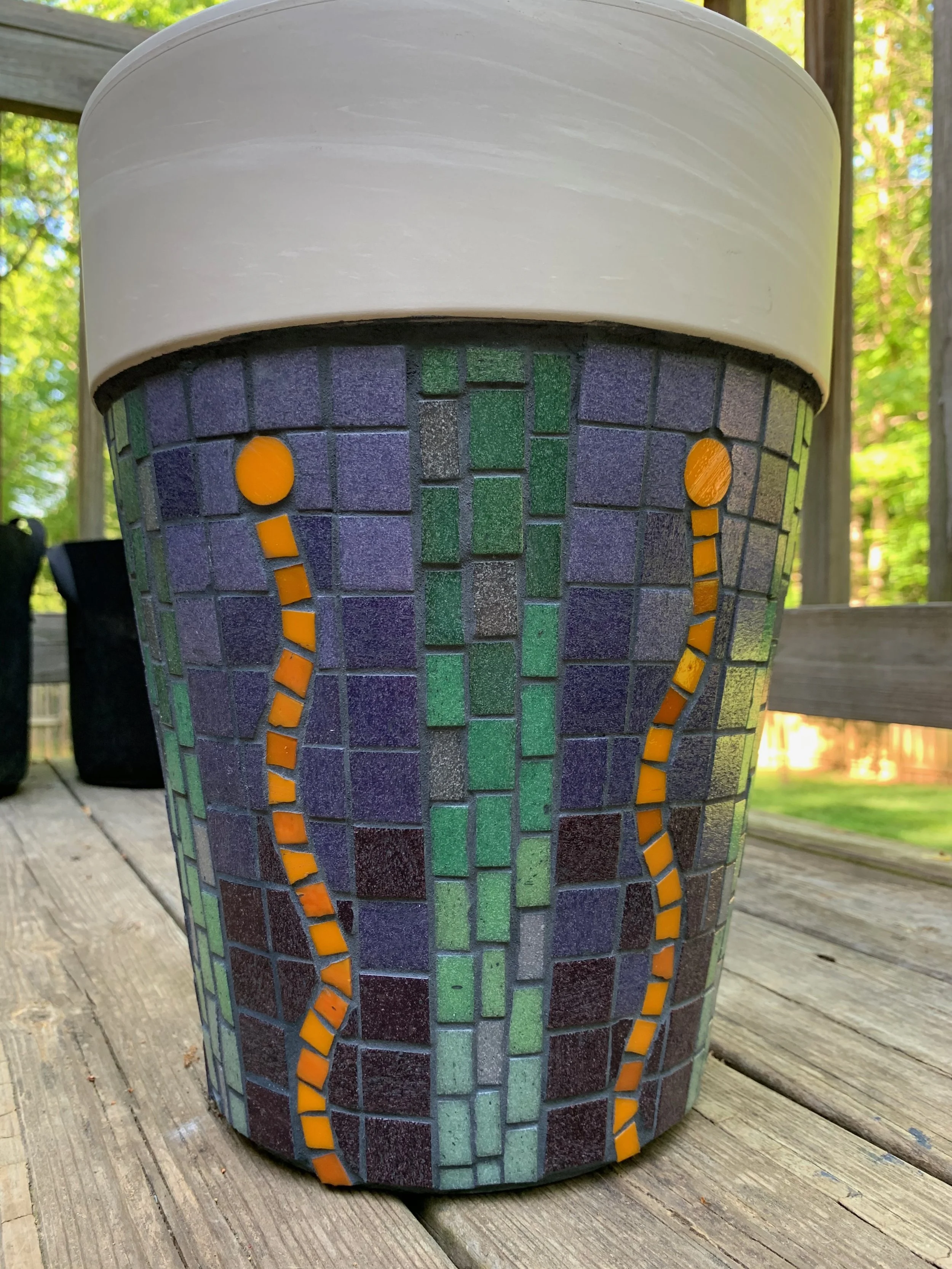 Vitreous glass tile on ceramic garden pot