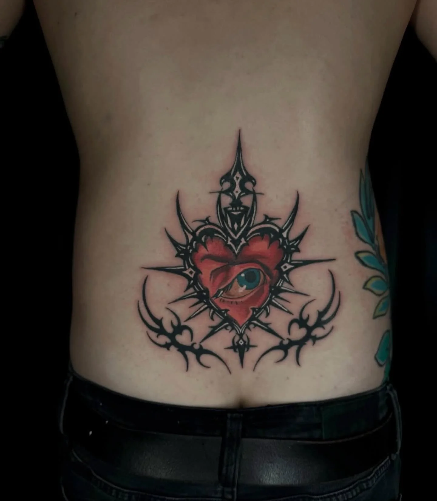 @malubiana out here redefining the lower back piece. 💉 Come see her Wednesday - Saturday. 

#cybersigilism #cybersigilismtattoo #eye #tattoo #heart