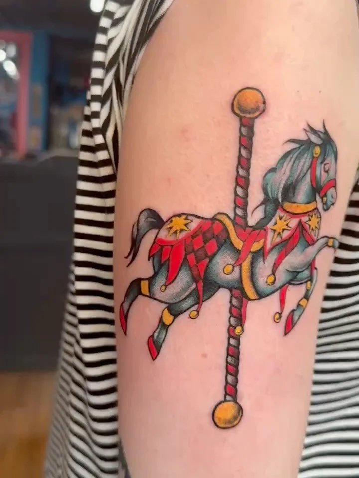 The majestic carousel horse. Customized beautifully for this client by @malubiana The use of primary colors really bring a classic feel to this piece. 

#horse #horsetattoo #carousels #primarycolors #tattoo