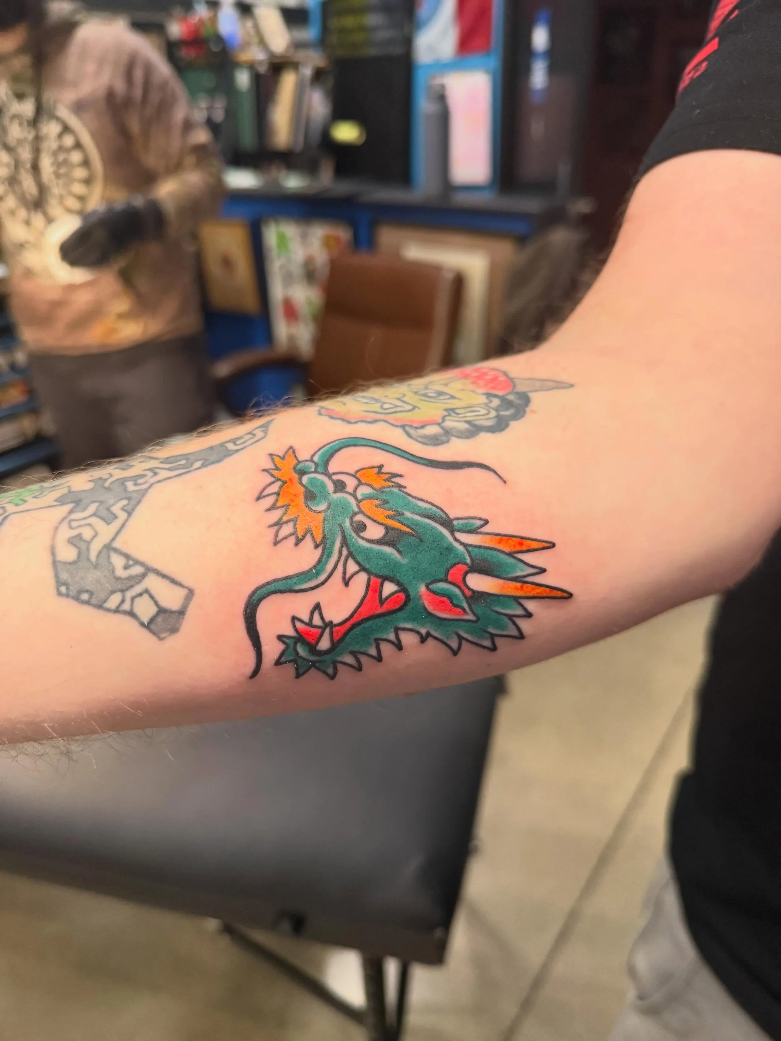Get what you get dragons, crispy lettering and bold colors! All in a days work for @bcblevinstattooer Tattoos, made to order every Thursday through Sunday. 

#dragon #lettering #fish #tattoo #columbustattooers