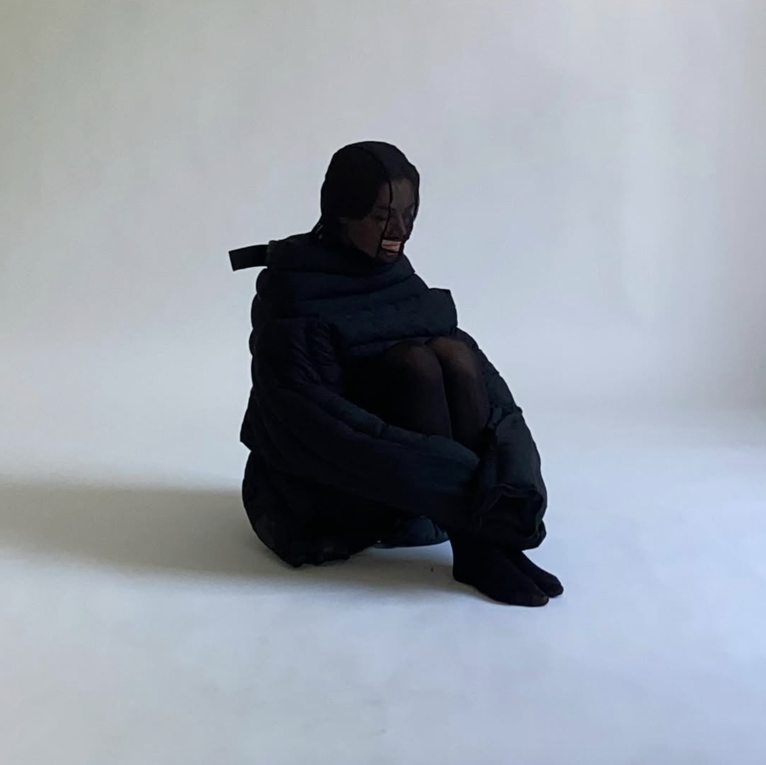 Black Crisis Suit Sitting