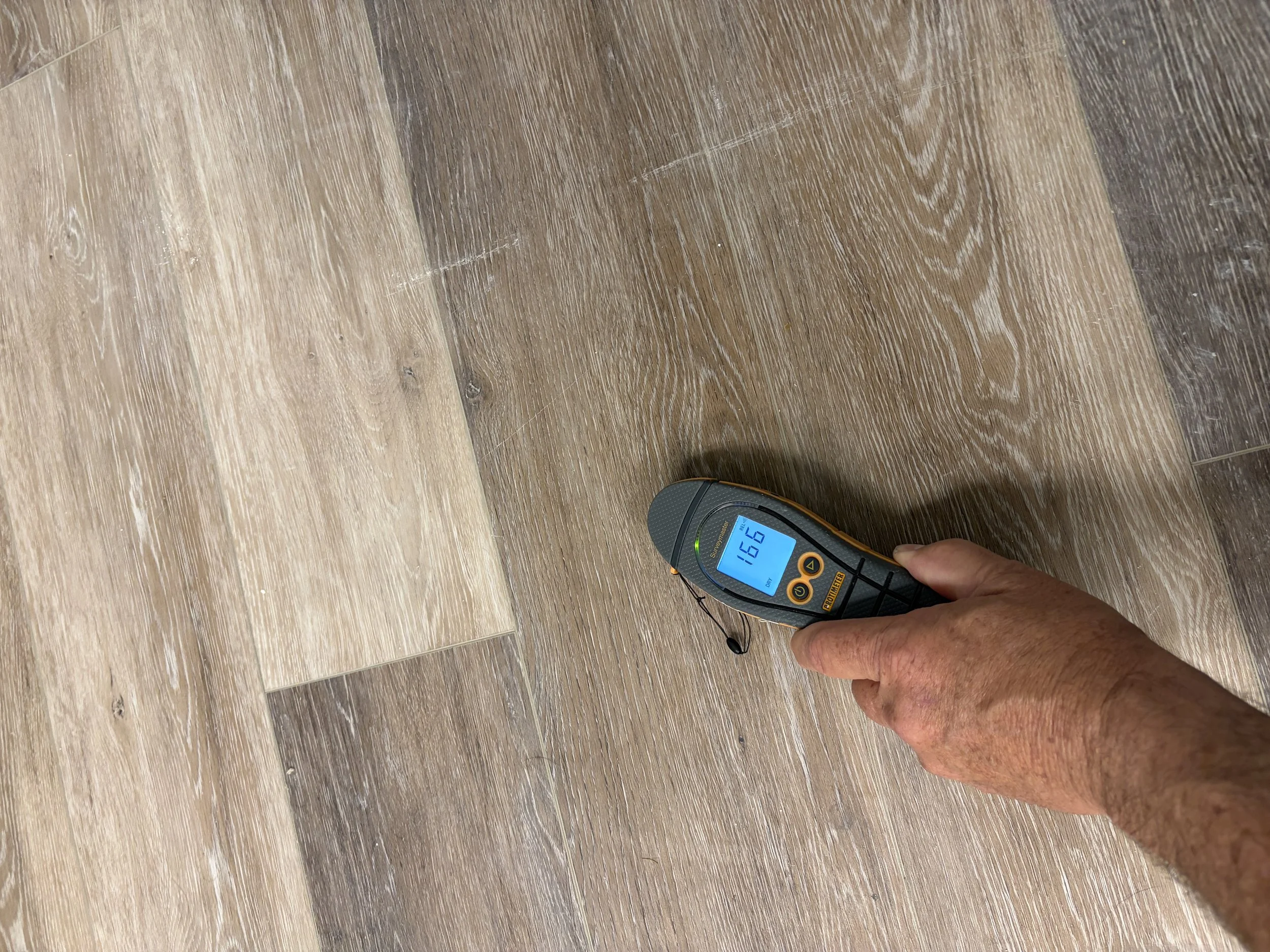Photo of moisture meter used during mold inspection in Apopka