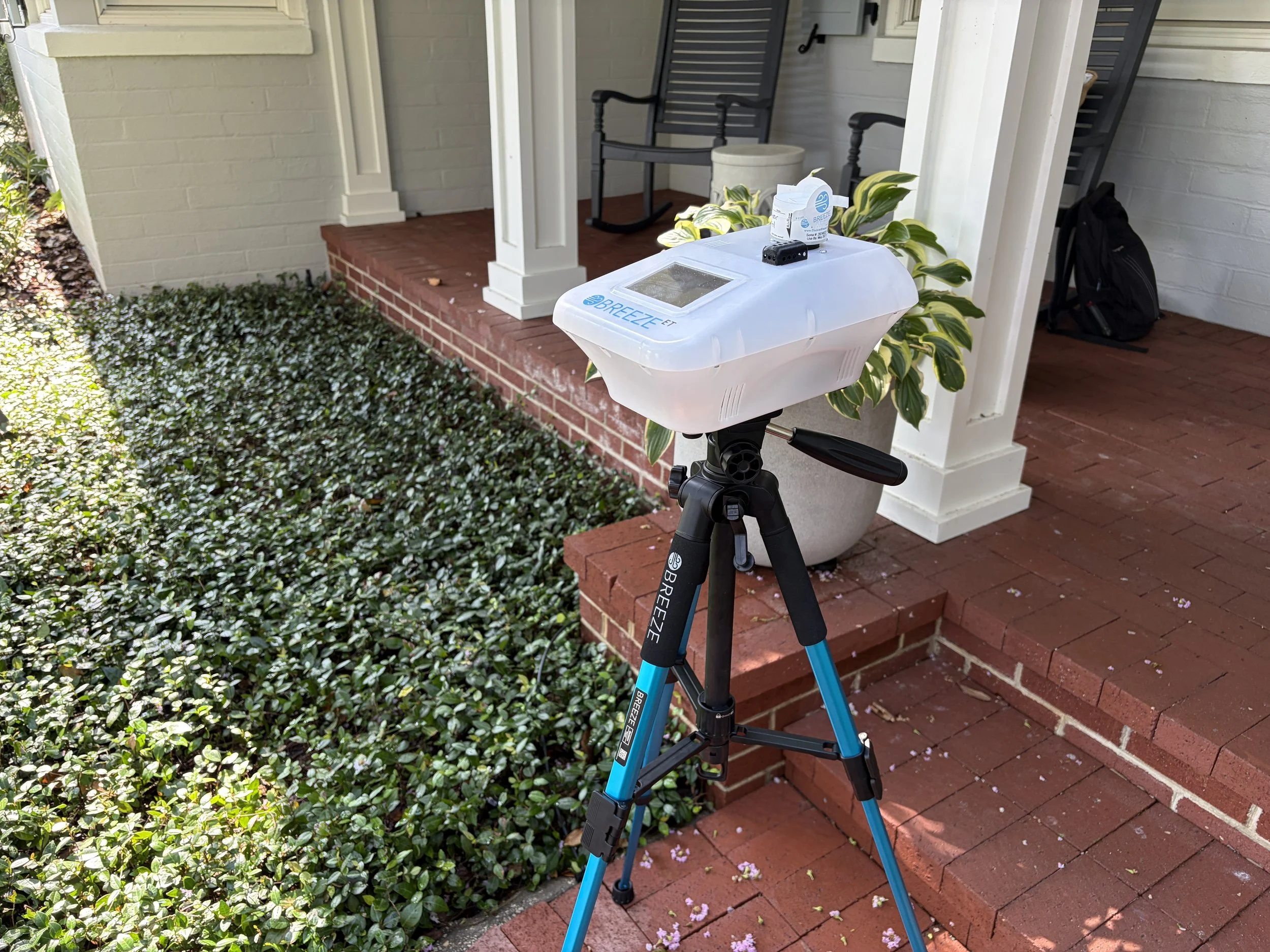 Air quality monitor taking sample of the outdoor air for mold inspection.