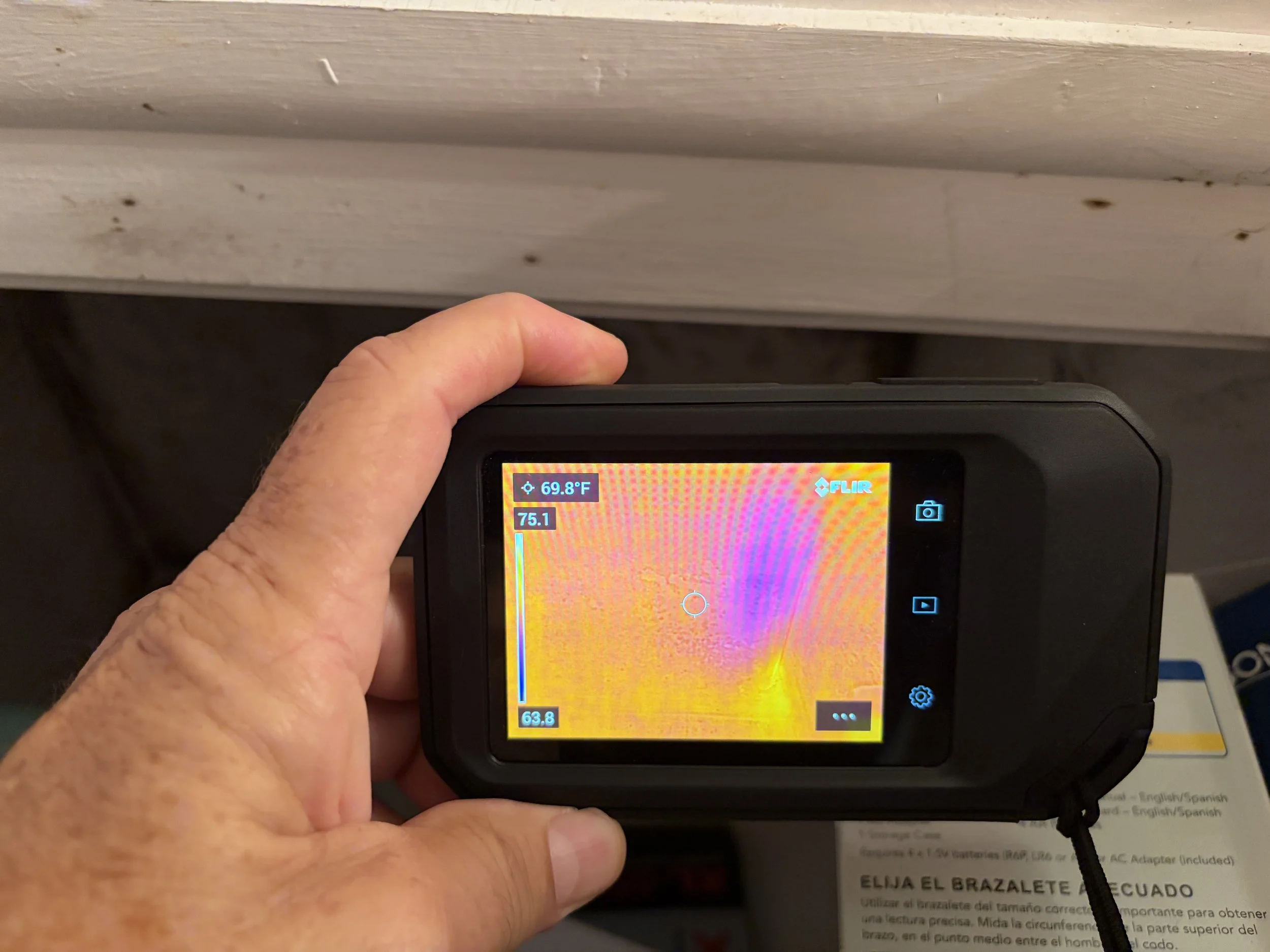 Photo of a thermal camera being used during a mold inspection.