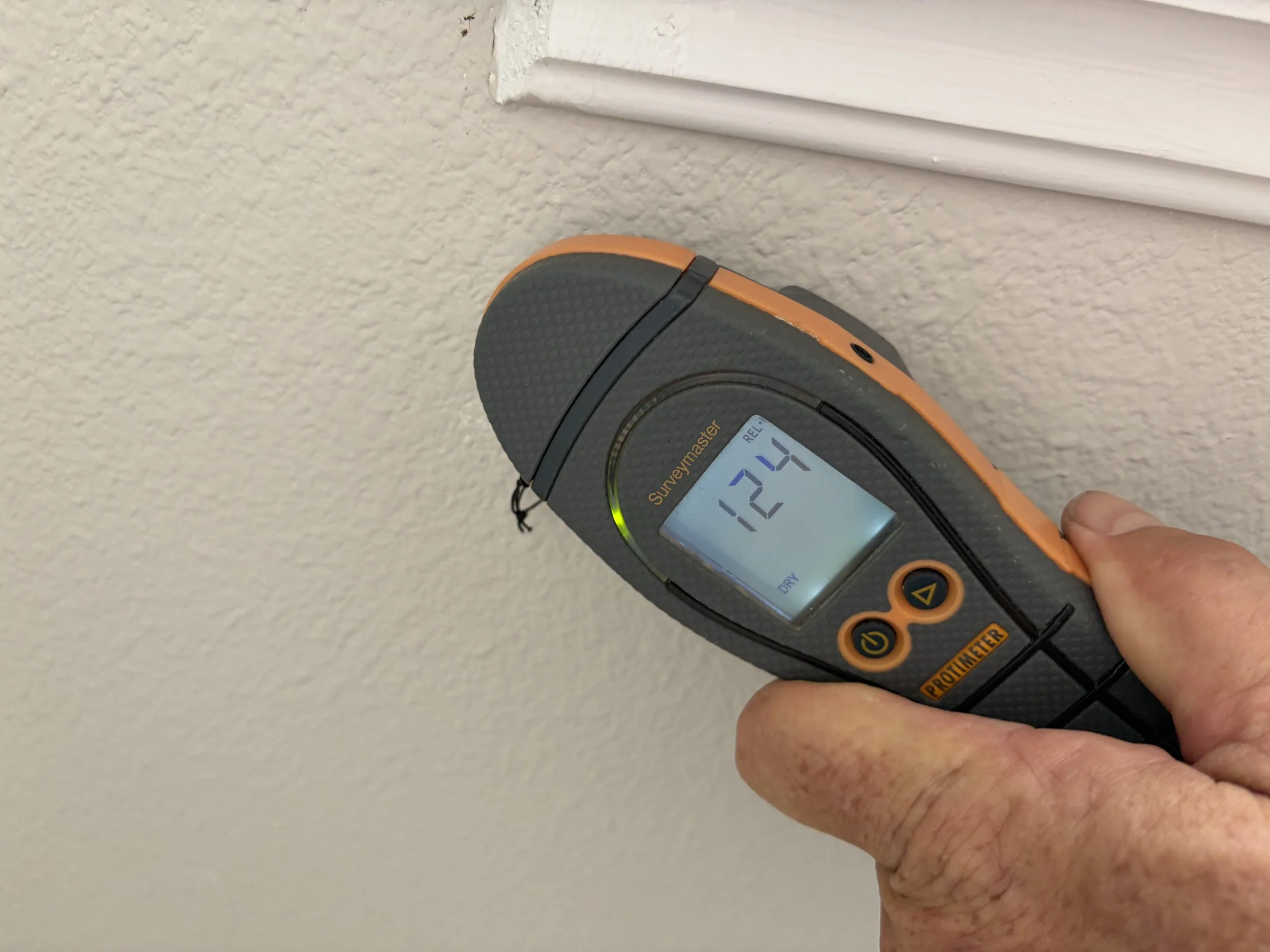 Photo of moisture meter during mold inspection in Casselberry