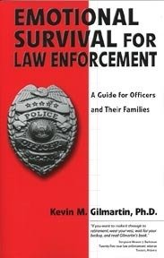Book cover titled 'Emotional Survival for Law Enforcement' by Kevin M. Gilmartin, Ph.D., featuring a police badge with a star and eagle.