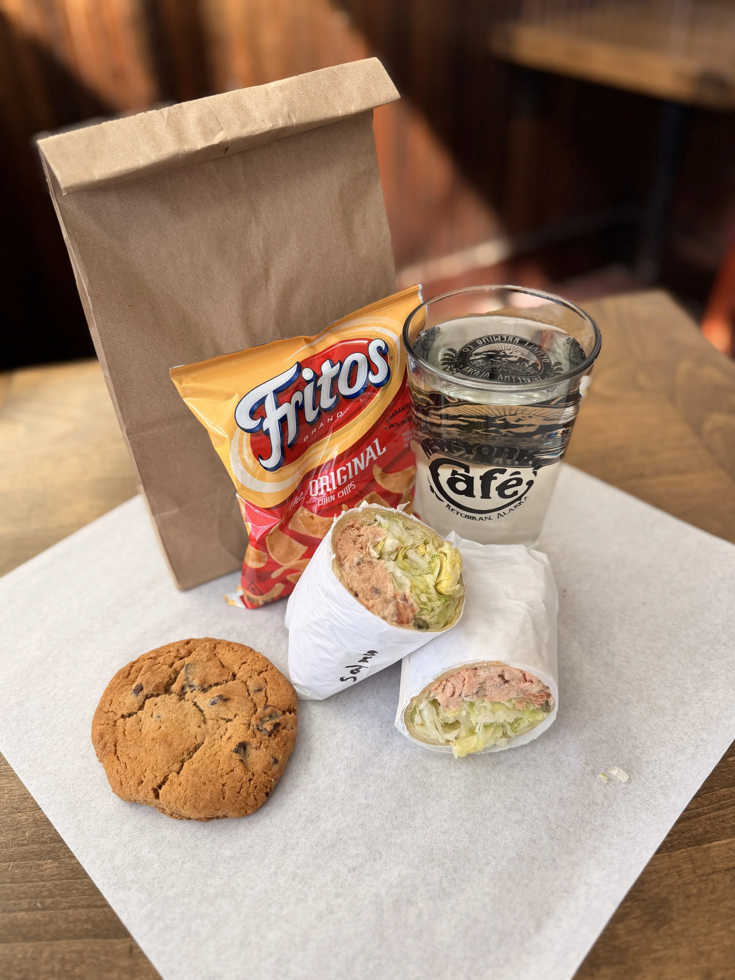 salmon wrap, cookie, chips, drinks, smoked salmon, lunch, whales and lunch