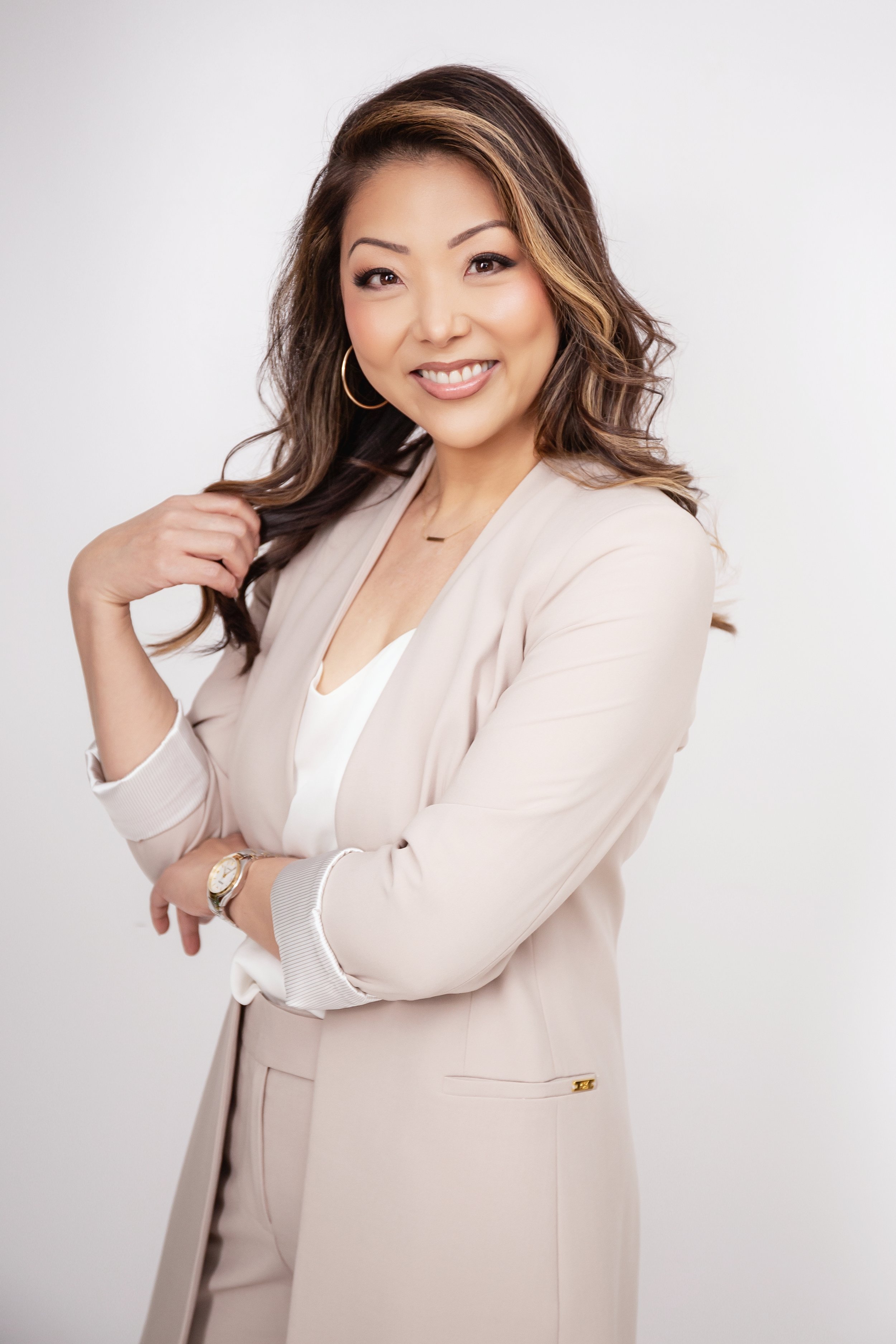 Chenise Kanemoto, a high-performance mindset and business coach for YouTube creators.