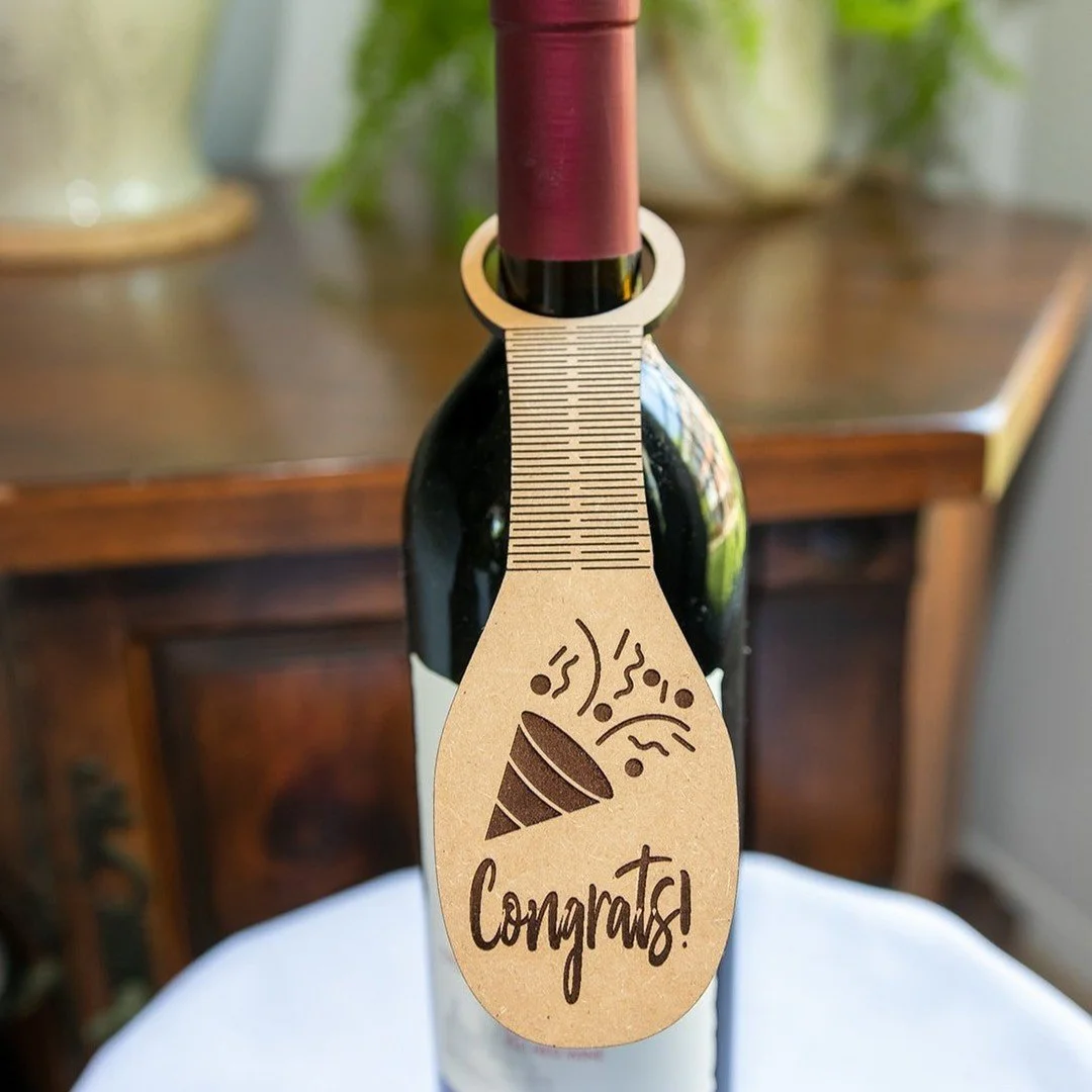 it's a party bottle tag 
flexible wine bottle tag made using high quality mdf.

#wine #congrats #party #laserengraving #glowforge #glowforgemade #withrefugees #refugees #madeinusa #womenownedbusiness #minoritywomen #gift