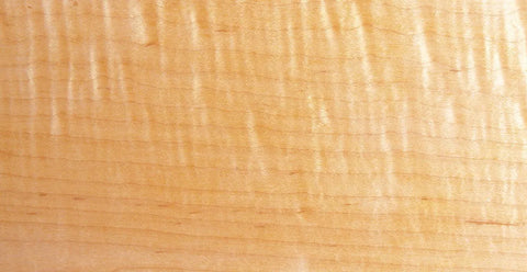 Close-up of a wooden surface with a light finish.