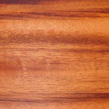 Close-up of a wooden surface, showing natural wood grain and texture.