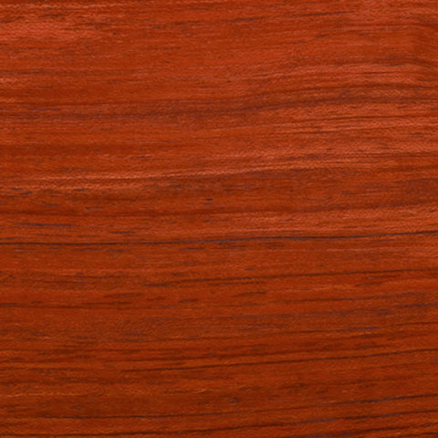 Close-up of a wooden surface with a reddish-brown finish.