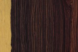 Close-up of two types of wood textures, one light and one dark.