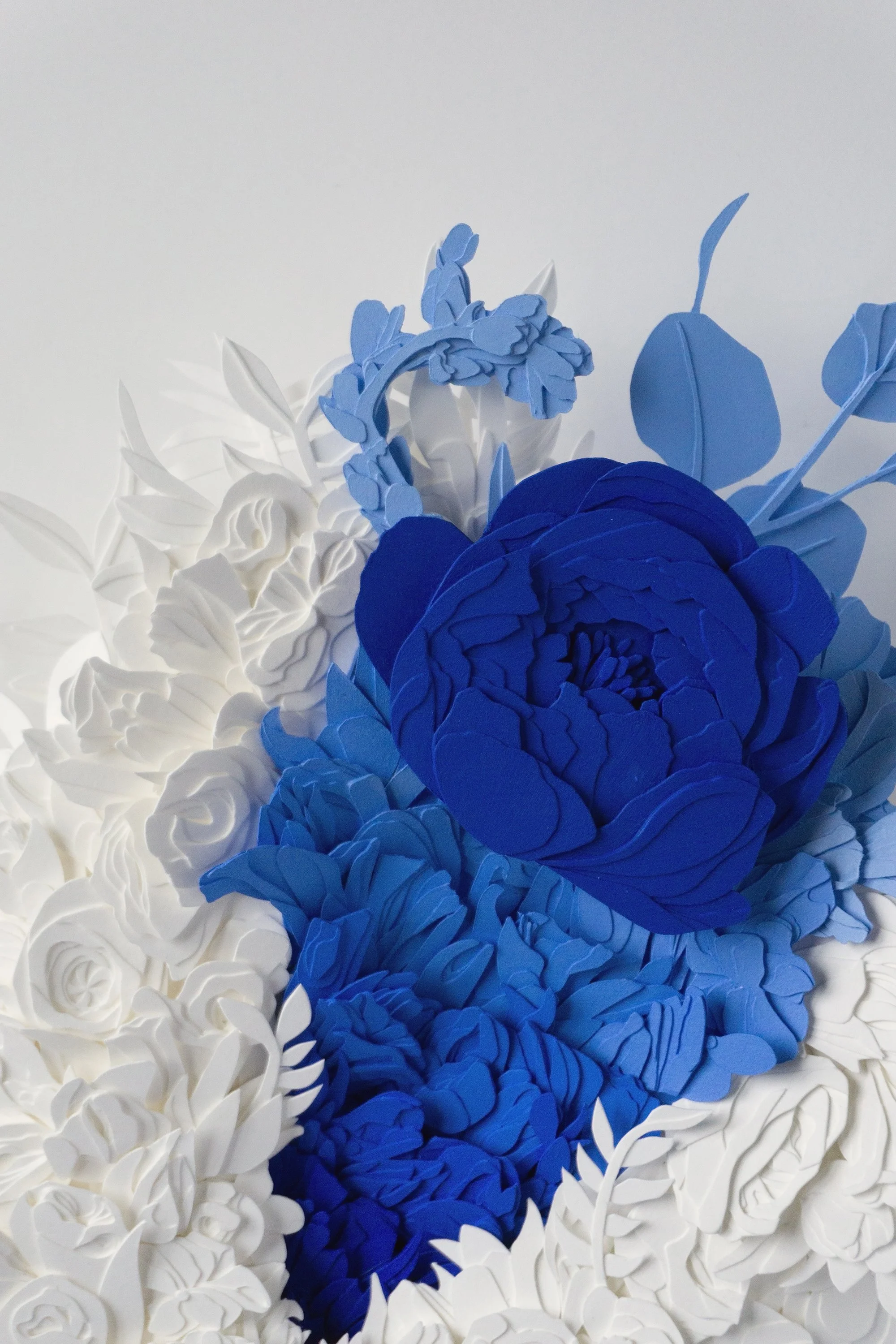 Explosion #18, 2022 (detail). Cut paper, glue, and acrylic paint, 22 x 18 x 3.5”. 