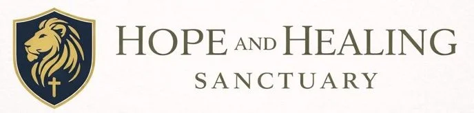 Logo of Hope and Healing Sanctuary with a lion crest and a cross.