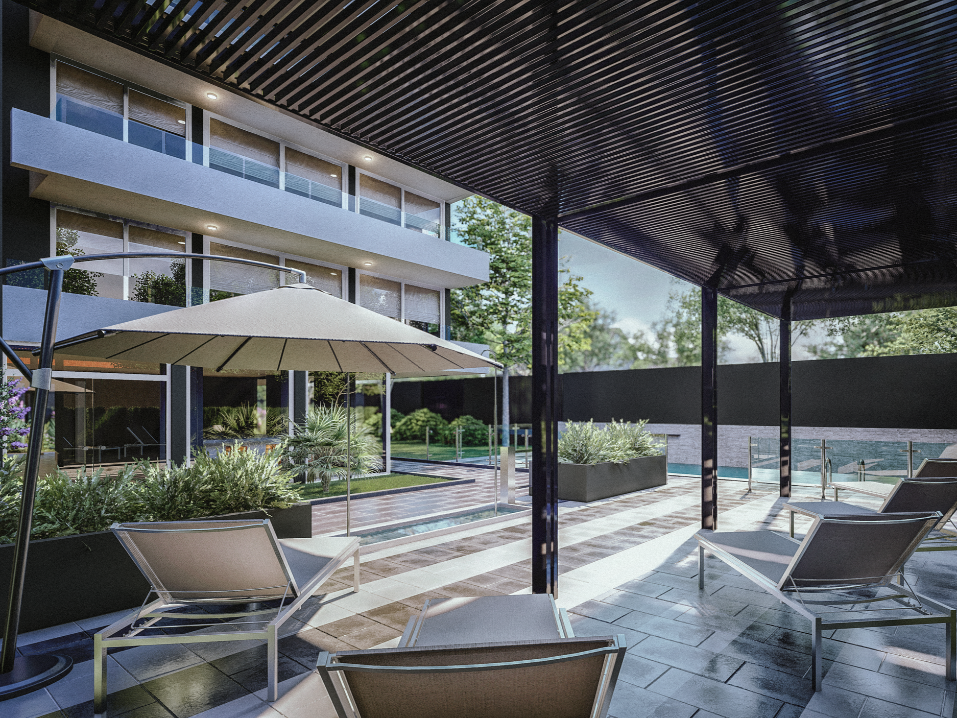 Modern outdoor patio with lounge chairs, large beige umbrella, and surrounding greenery, adjacent to a multi-story building with balconies.