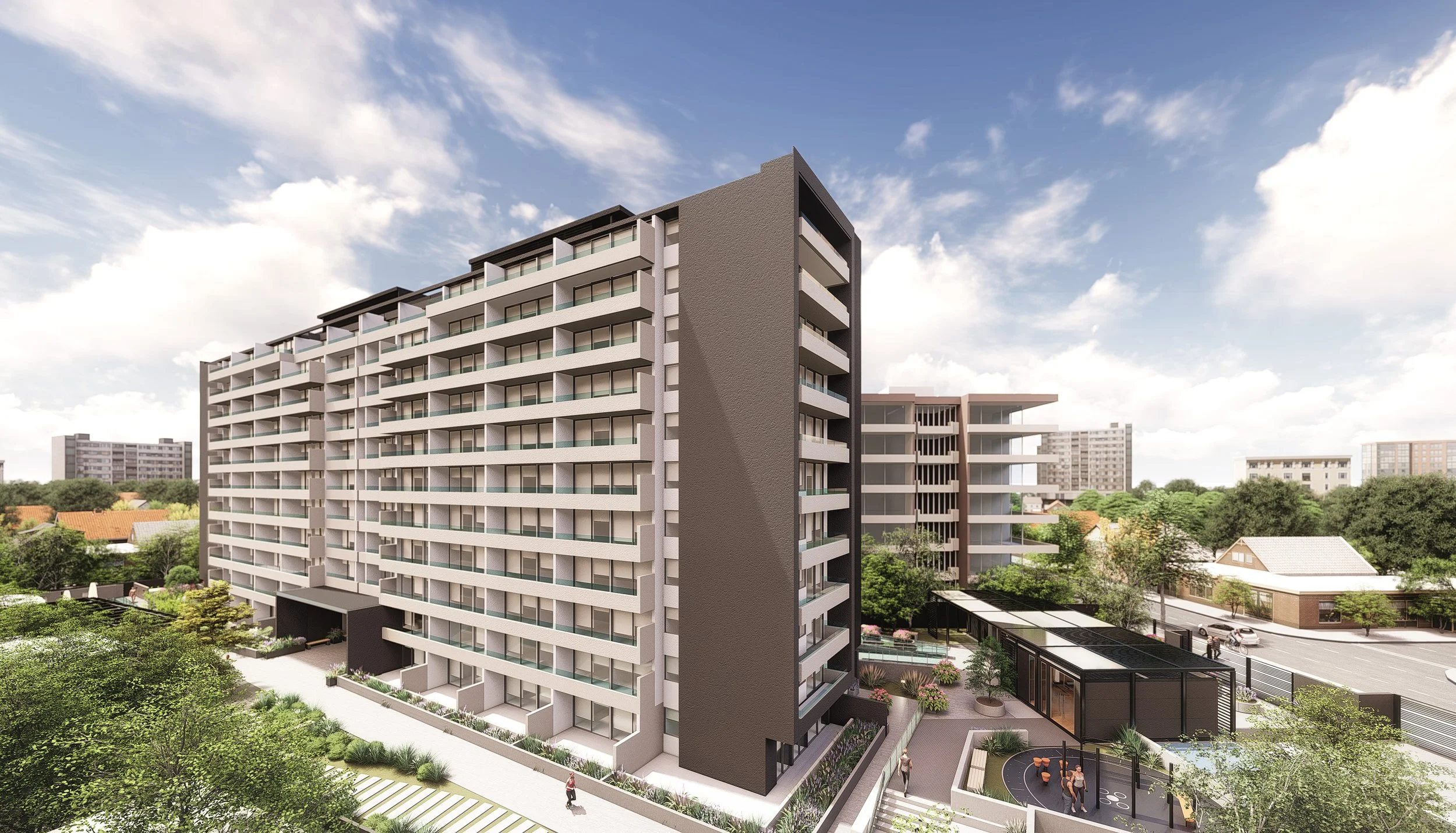 Modern multi-story apartment building with balconies, large windows, and landscaped surroundings including trees and walkways.