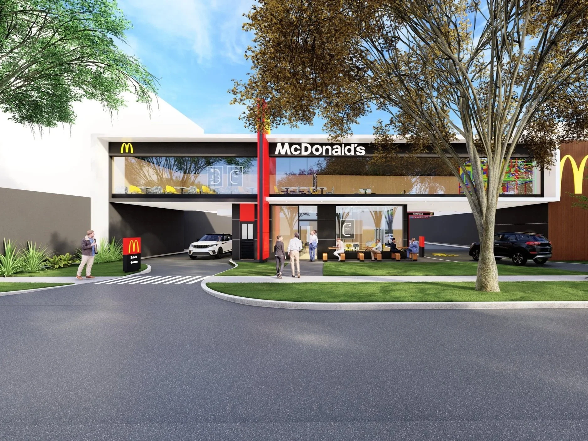 Modern McDonald's restaurant with large glass windows, outdoor seating, cars parked, and people walking in front. The McDonald's logo and signage are visible, with a tree in the foreground and a clear blue sky.
