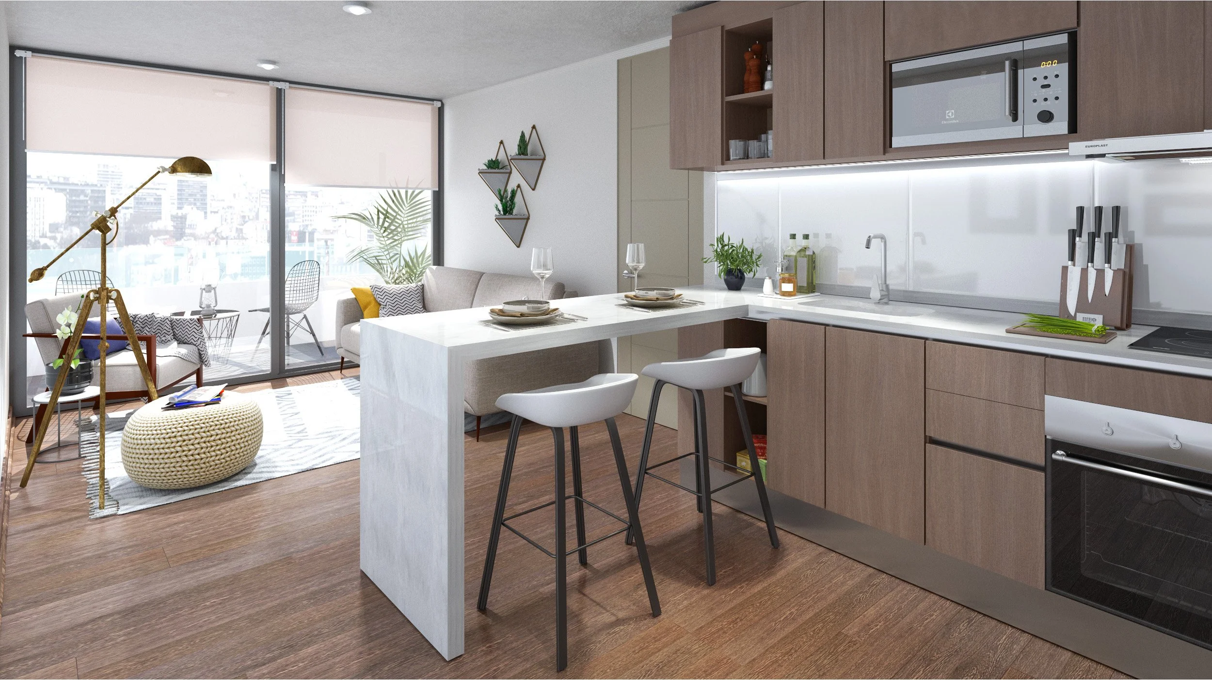 A modern open-concept kitchen and living room with a view of a city skyline through large windows. The kitchen features wooden cabinets, a microwave, and a white countertop with a sink. There is a small kitchen island with two white bar stools, set with plates, bowls, and wine glasses. The living area has a beige couch with cushions, a round ottoman, a wooden chair with a blanket, a floor lamp, and wall-mounted shelves with plants. The space is bright and airy with hardwood floors and natural light.