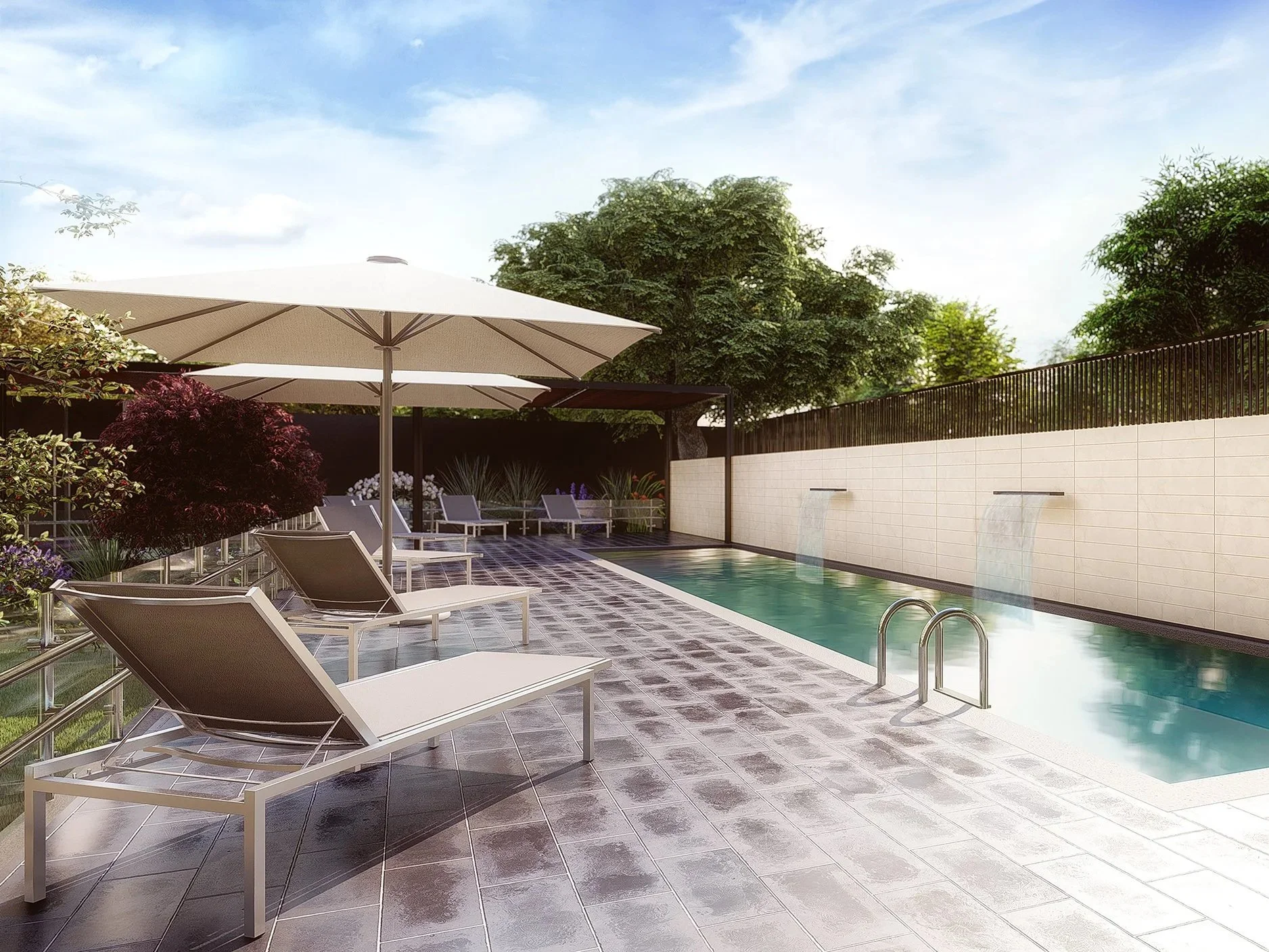 Outdoor swimming pool with lounge chairs, umbrellas, lush greenery, and a water feature wall with waterfalls, under a partly cloudy sky.