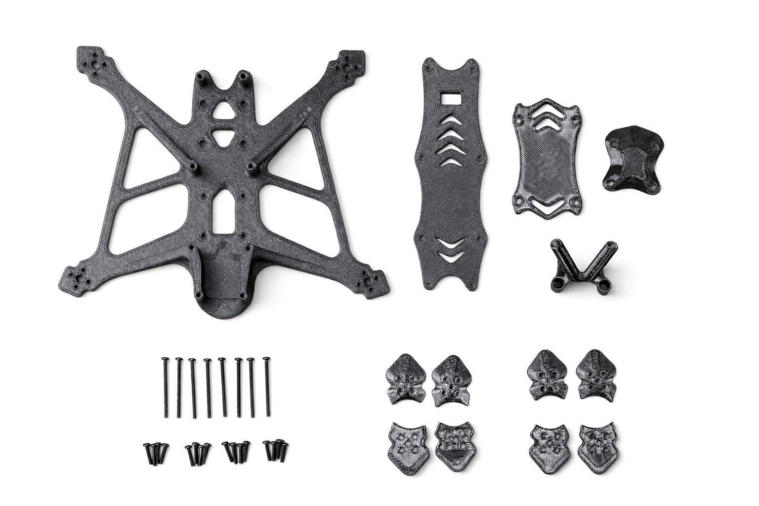 Set of black drone frame parts including main frame, landing gear, motor mounts, and screws on a white background.