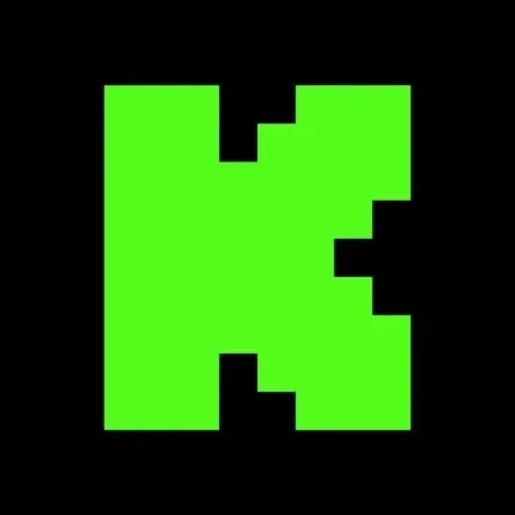 A pixelated green shape on a black background, resembling a block or a simplified abstract figure.