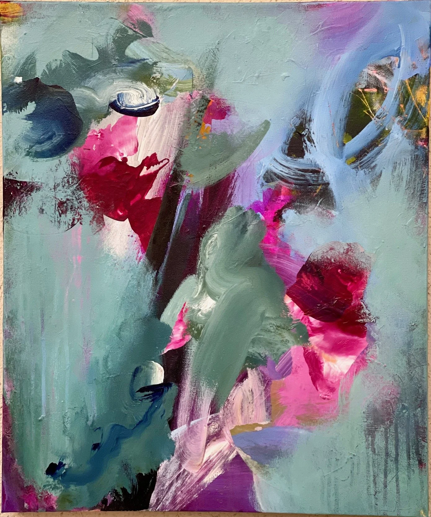 Abstract painting with bold brushstrokes in pink, red, green, purple, black, and blue on a textured canvas.