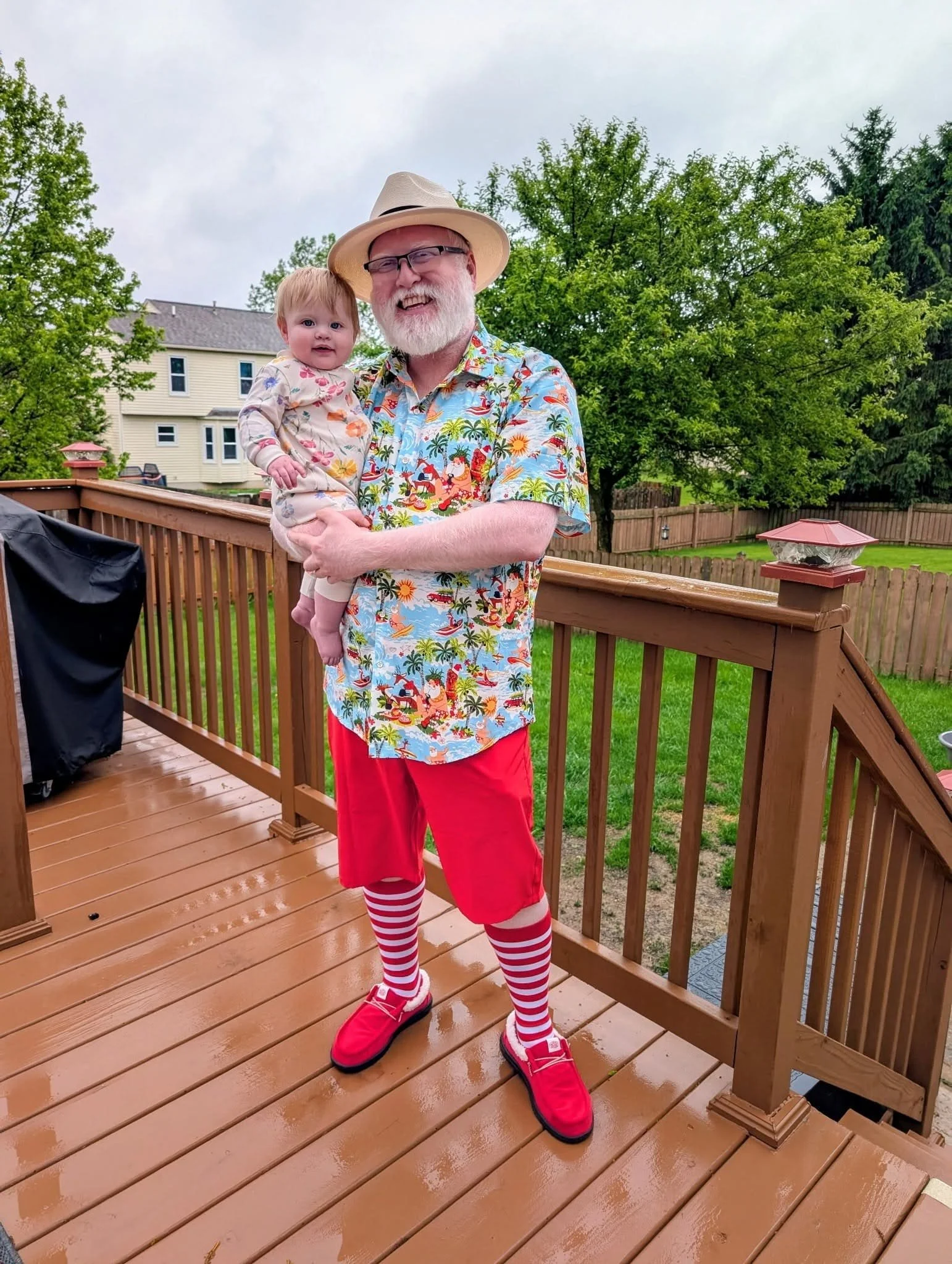 Santa Snow in summer mode visits a child outside