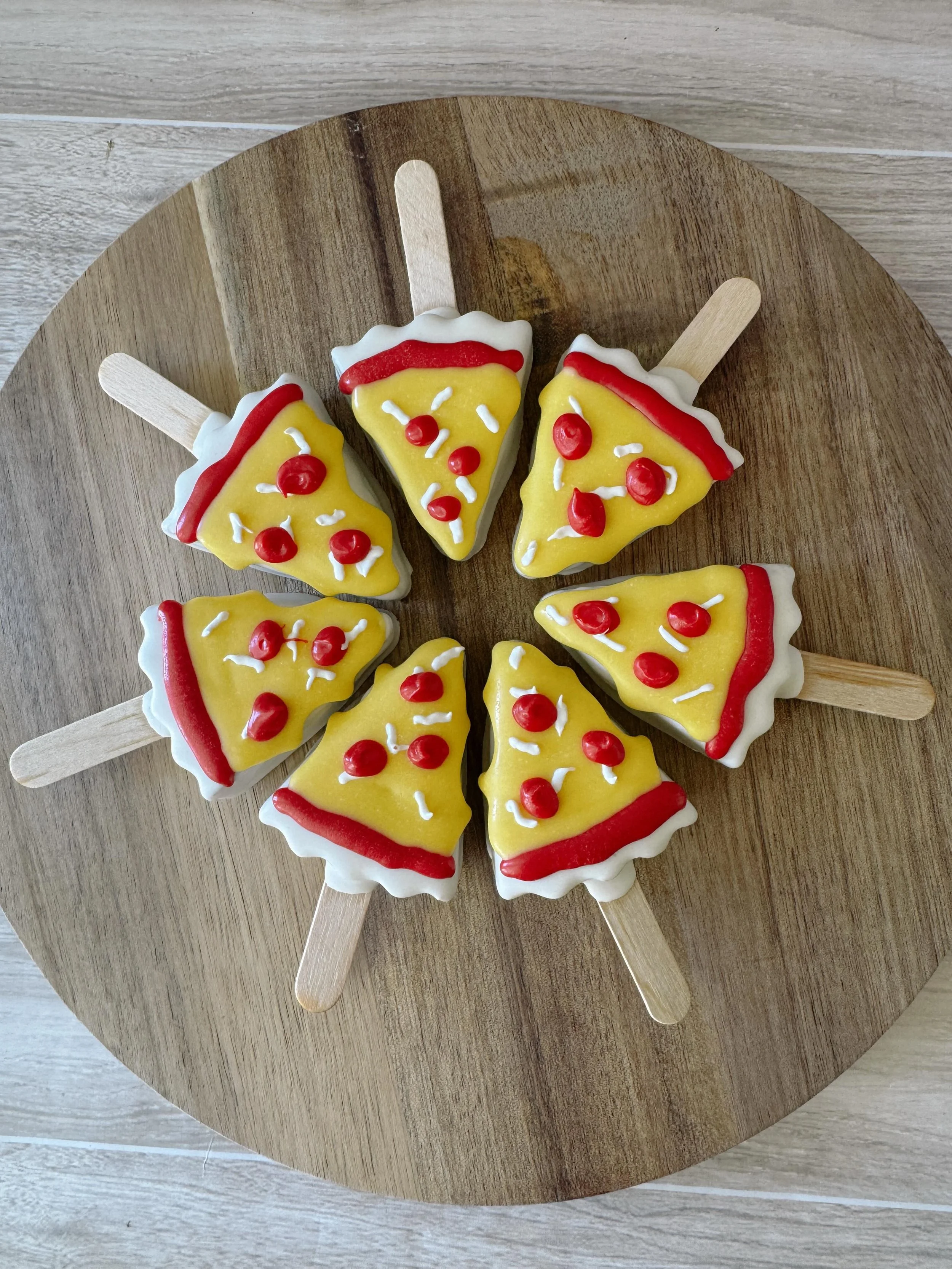 A pizza my heart 🍕❤️

These pizza slice cake pops are the perfect recipe for a party&mdash;cute, fun, and guaranteed to get people talking! Whether it&rsquo;s a birthday, game day, or pizza-themed celebration, we can turn your favorite ideas into ed