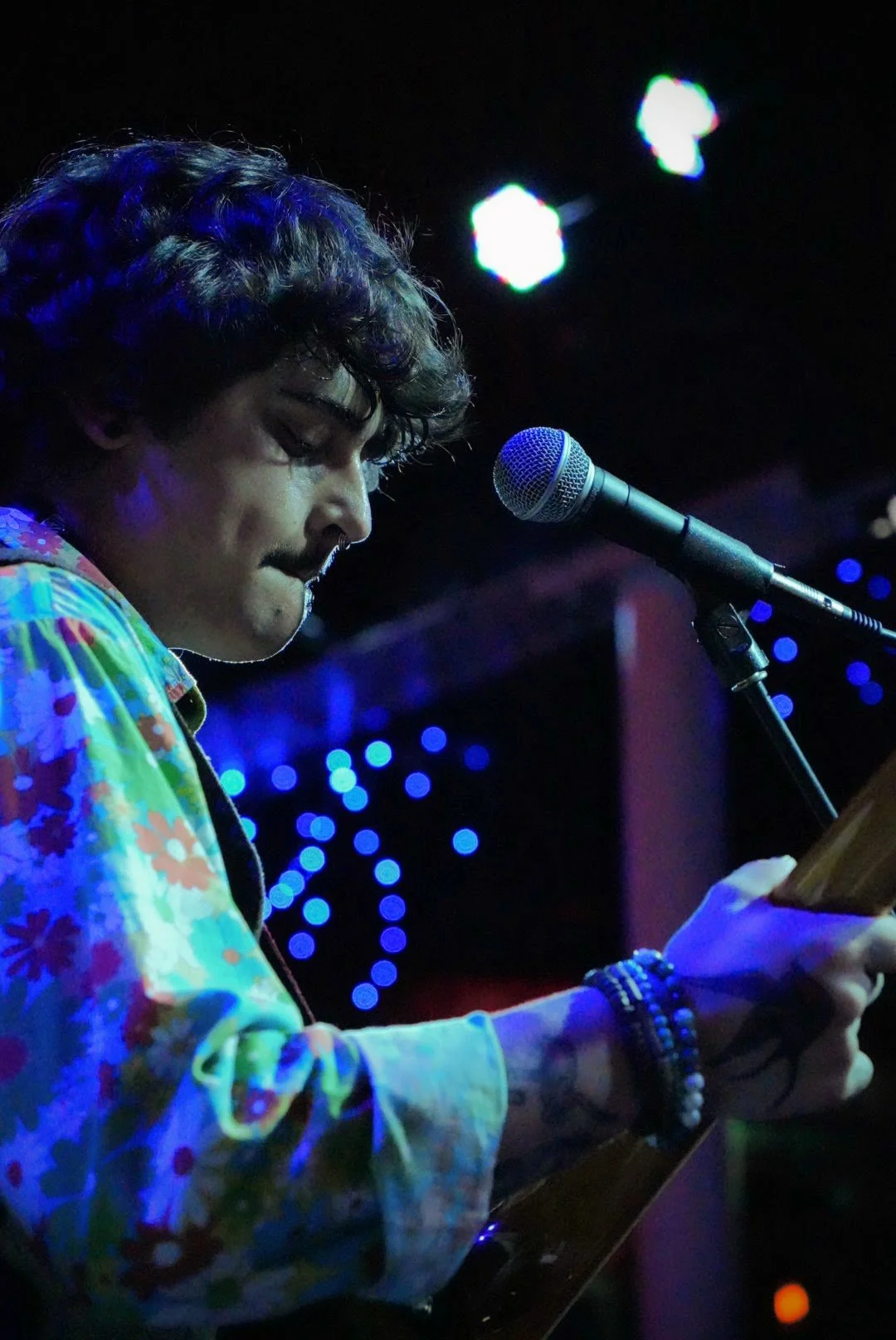 Casper Willow, of the band GrooveSmash, performing live under the glowing lights of the world-famous Slippery Noodle in Indianapolis.