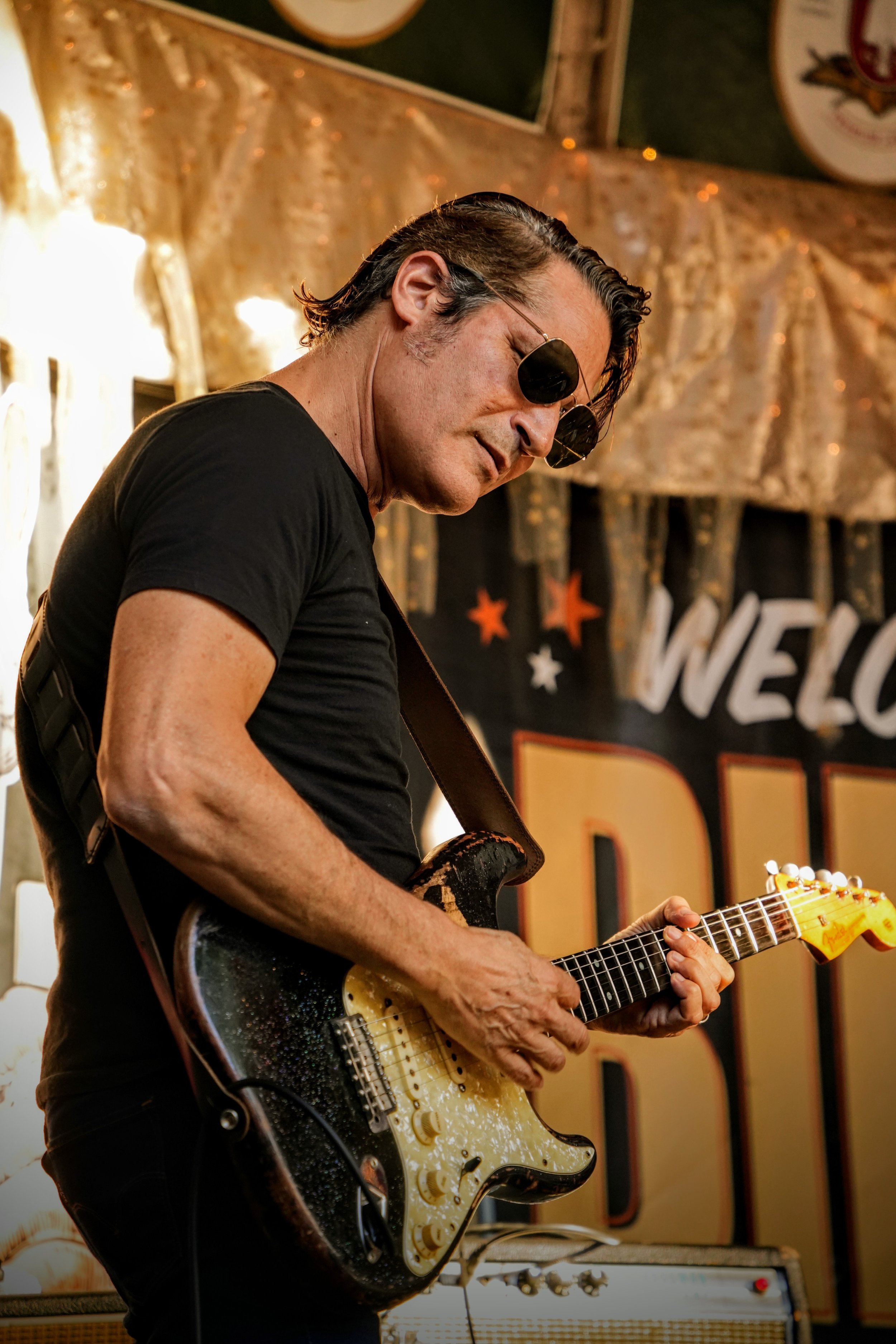 Benito DiBartoli performing on a Fender Stratocaster live from The Rathskellar Biergarten as part of the annual Stevie Ray Vaughn (SRV) tribute show.