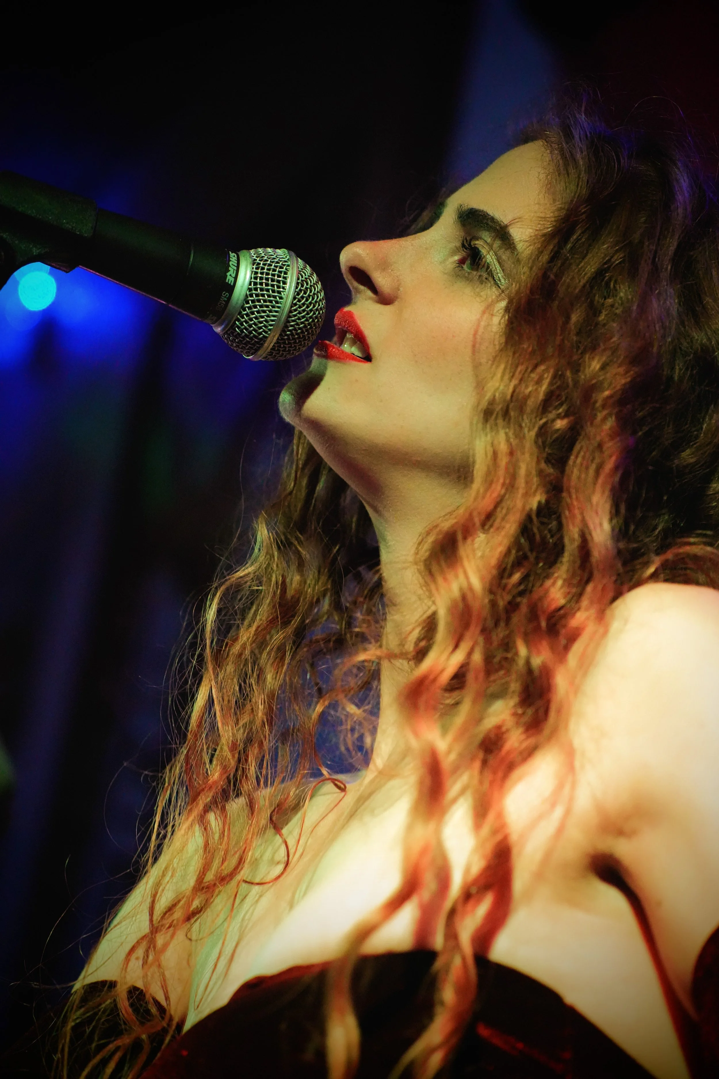 Maya Sloane performs under the lights of the Slippery Noodle Inn.