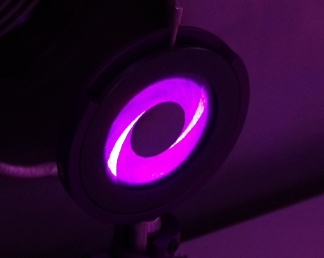 Laser beam passing through an alignment iris, seen on the laser beam viewer.