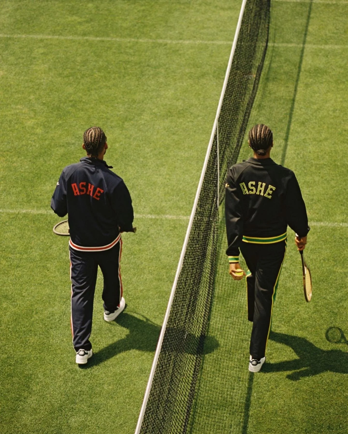 A split view of a person walking on a tennis court, holding a tennis racket, and dressed in black athletic clothing with the word 'ASHE' on the back, behind a net.