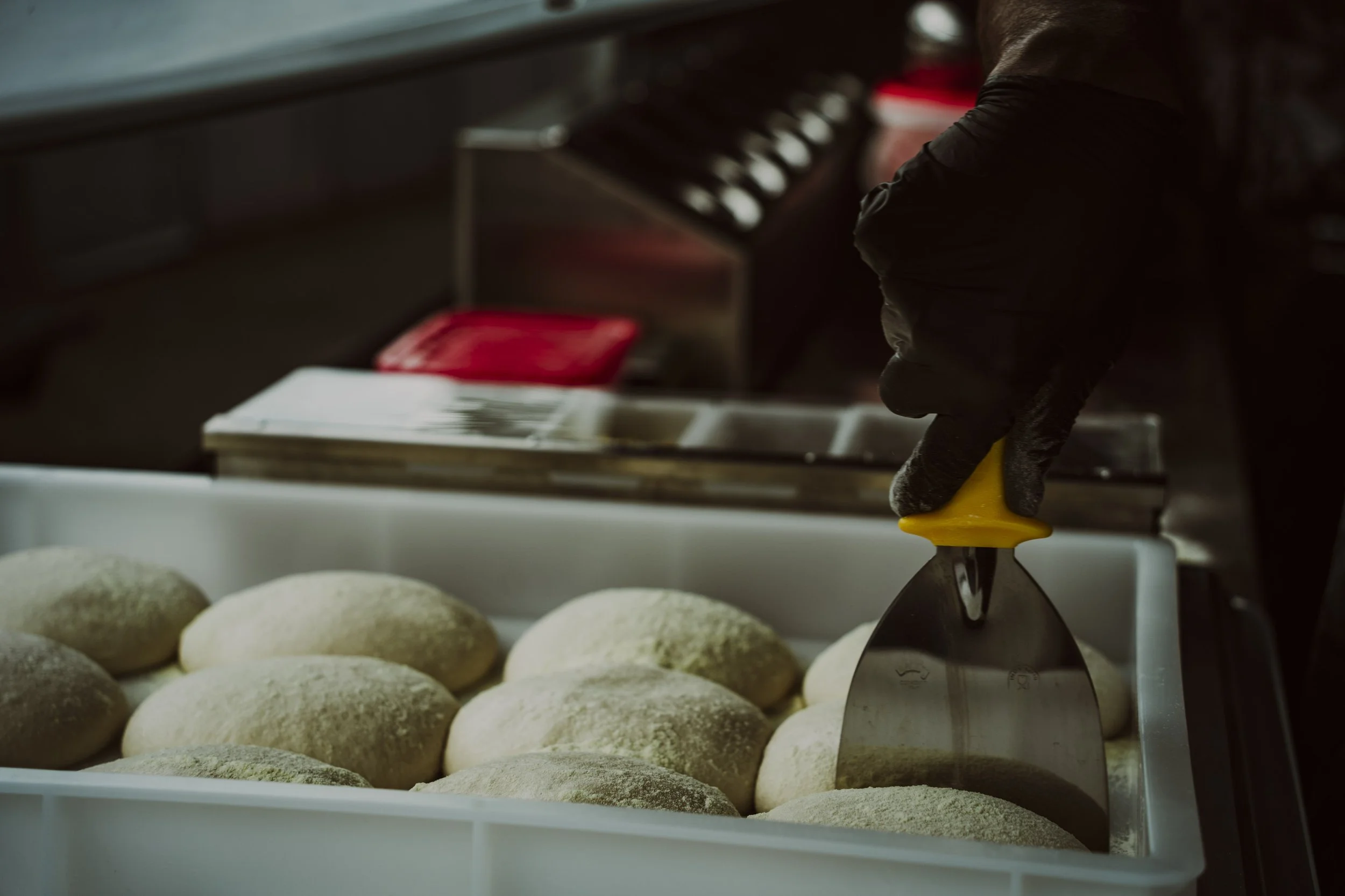 Freshly fermented 30-hour pizza dough balls prepared for stonebaked pizza at Curry Town Crawley